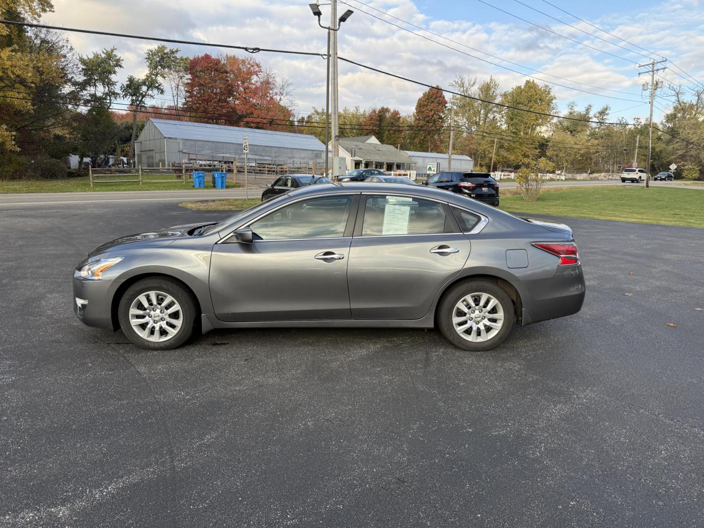 2015 Silver /Black Nissan Altima 2.5 S (1N4AL3AP1FC) with an 2.5L I4 DOHC 16V engine, Automatic transmission, located at 11115 Chardon Rd. , Chardon, OH, 44024, (440) 214-9705, 41.580246, -81.241943 - 2015 Nissan Altima 2.5 S – Low Mileage, Impressive Efficiency, and Everyday Comfort Enjoy outstanding reliability and remarkable efficiency with this 2015 Nissan Altima 2.5 S, boasting only 22,008 miles! Its fuel-sipping 2.5L I4 engine returns up to 37 MPG on the highway, making it the perfect - Photo#12