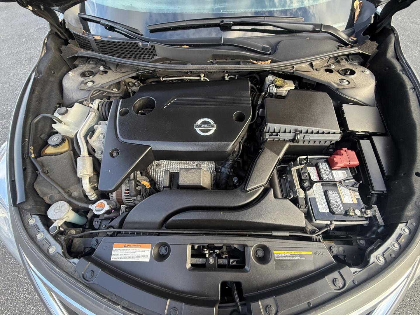 2015 Silver /Black Nissan Altima 2.5 S (1N4AL3AP1FC) with an 2.5L I4 DOHC 16V engine, Automatic transmission, located at 11115 Chardon Rd. , Chardon, OH, 44024, (440) 214-9705, 41.580246, -81.241943 - 2015 Nissan Altima 2.5 S – Low Mileage, Impressive Efficiency, and Everyday Comfort Enjoy outstanding reliability and remarkable efficiency with this 2015 Nissan Altima 2.5 S, boasting only 22,008 miles! Its fuel-sipping 2.5L I4 engine returns up to 37 MPG on the highway, making it the perfect - Photo#15