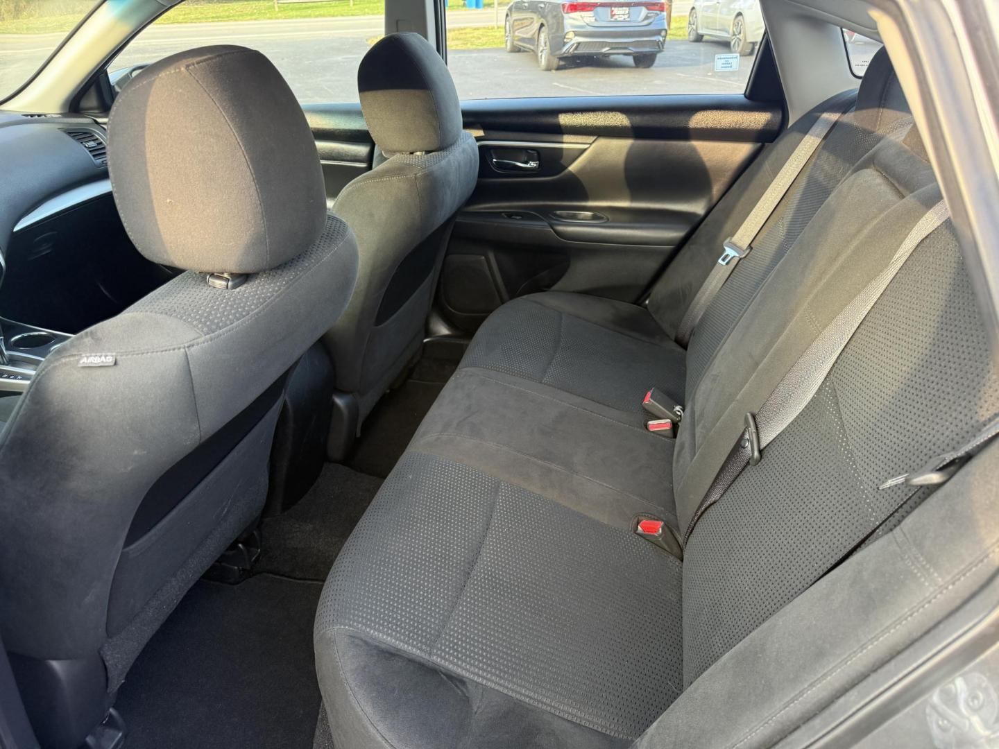 2015 Silver /Black Nissan Altima 2.5 S (1N4AL3AP1FC) with an 2.5L I4 DOHC 16V engine, Automatic transmission, located at 11115 Chardon Rd. , Chardon, OH, 44024, (440) 214-9705, 41.580246, -81.241943 - 2015 Nissan Altima 2.5 S – Low Mileage, Impressive Efficiency, and Everyday Comfort Enjoy outstanding reliability and remarkable efficiency with this 2015 Nissan Altima 2.5 S, boasting only 22,008 miles! Its fuel-sipping 2.5L I4 engine returns up to 37 MPG on the highway, making it the perfect - Photo#37