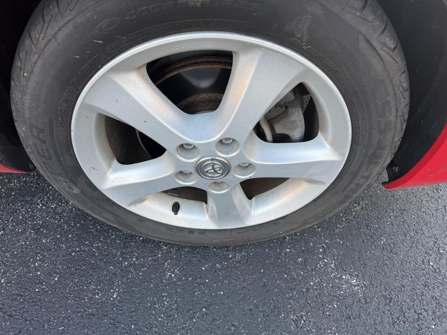 2005 Red /Tan Toyota Camry Solara XSE Convertible (4T1FA38P05U) with an 3.3L V6 DOHC 24V engine, Automatic transmission, located at 11115 Chardon Rd. , Chardon, OH, 44024, (440) 214-9705, 41.580246, -81.241943 - 2005 Toyota Camry Solara XSE – Stylish, Fun, and Loaded with Premium Features Turn heads in this sleek 2005 Toyota Camry Solara XSE. Powered by a smooth 3.3L V6 engine paired with a 5-speed automatic transmission, this sporty convertible offers a thrilling drive with the convenience of a power - Photo#4