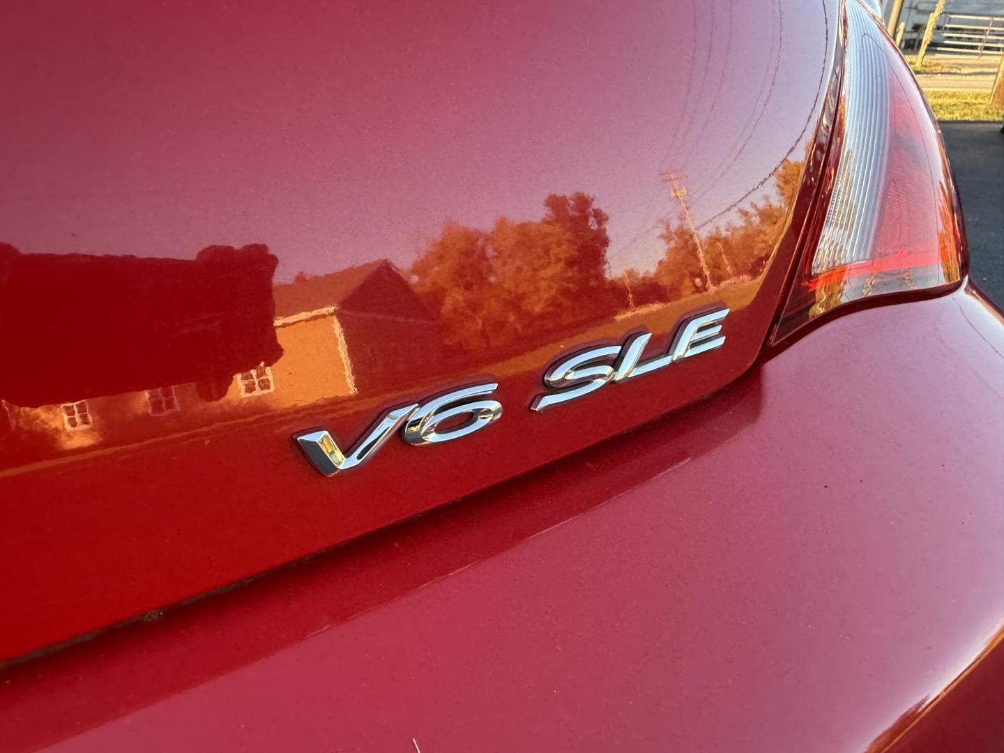 2005 Red /Tan Toyota Camry Solara XSE Convertible (4T1FA38P05U) with an 3.3L V6 DOHC 24V engine, Automatic transmission, located at 11115 Chardon Rd. , Chardon, OH, 44024, (440) 214-9705, 41.580246, -81.241943 - 2005 Toyota Camry Solara XSE – Stylish, Fun, and Loaded with Premium Features Turn heads in this sleek 2005 Toyota Camry Solara XSE. Powered by a smooth 3.3L V6 engine paired with a 5-speed automatic transmission, this sporty convertible offers a thrilling drive with the convenience of a power - Photo#9