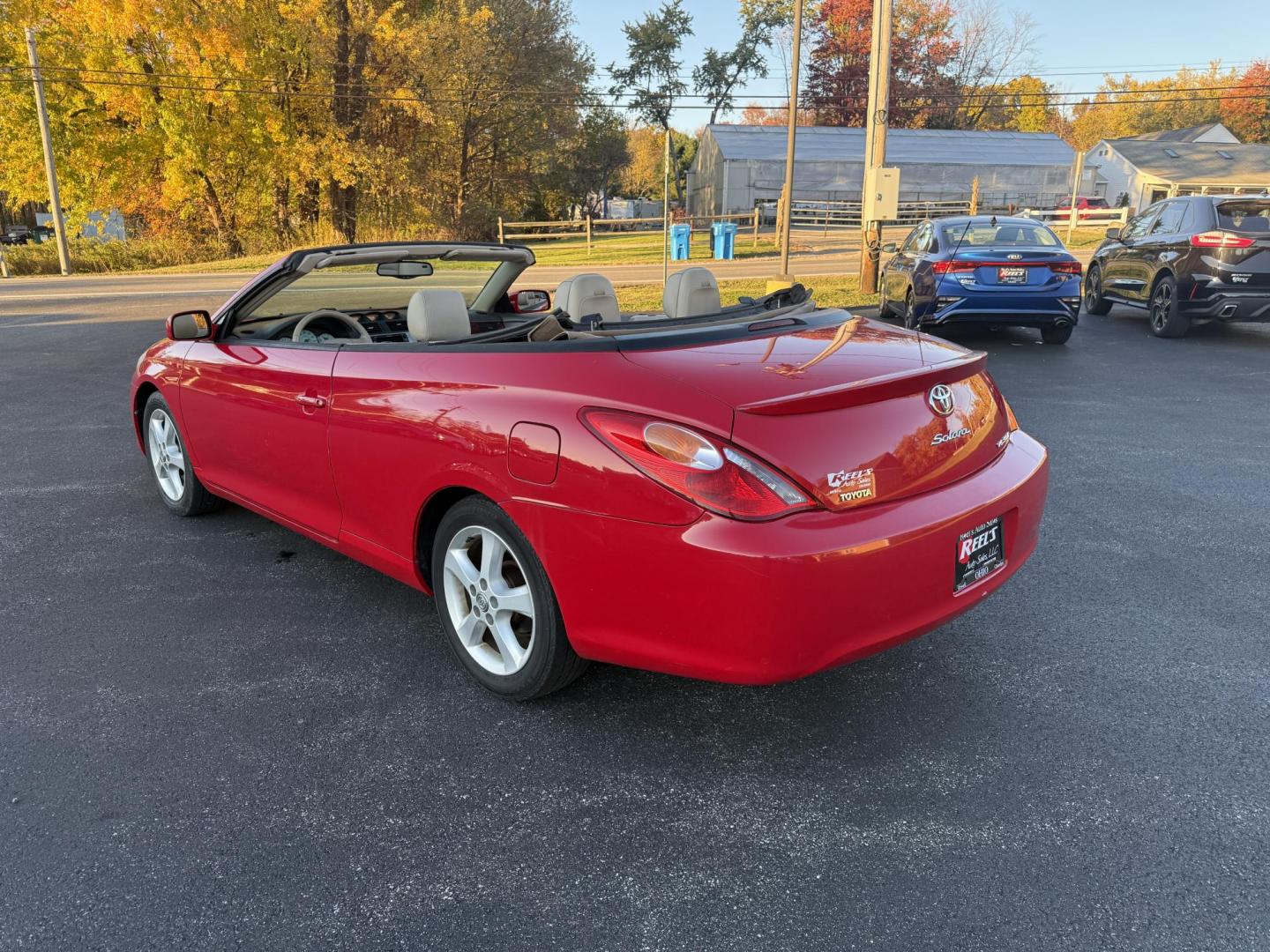 2005 Red /Tan Toyota Camry Solara XSE Convertible (4T1FA38P05U) with an 3.3L V6 DOHC 24V engine, Automatic transmission, located at 11115 Chardon Rd. , Chardon, OH, 44024, (440) 214-9705, 41.580246, -81.241943 - 2005 Toyota Camry Solara XSE – Stylish, Fun, and Loaded with Premium Features Turn heads in this sleek 2005 Toyota Camry Solara XSE. Powered by a smooth 3.3L V6 engine paired with a 5-speed automatic transmission, this sporty convertible offers a thrilling drive with the convenience of a power - Photo#10