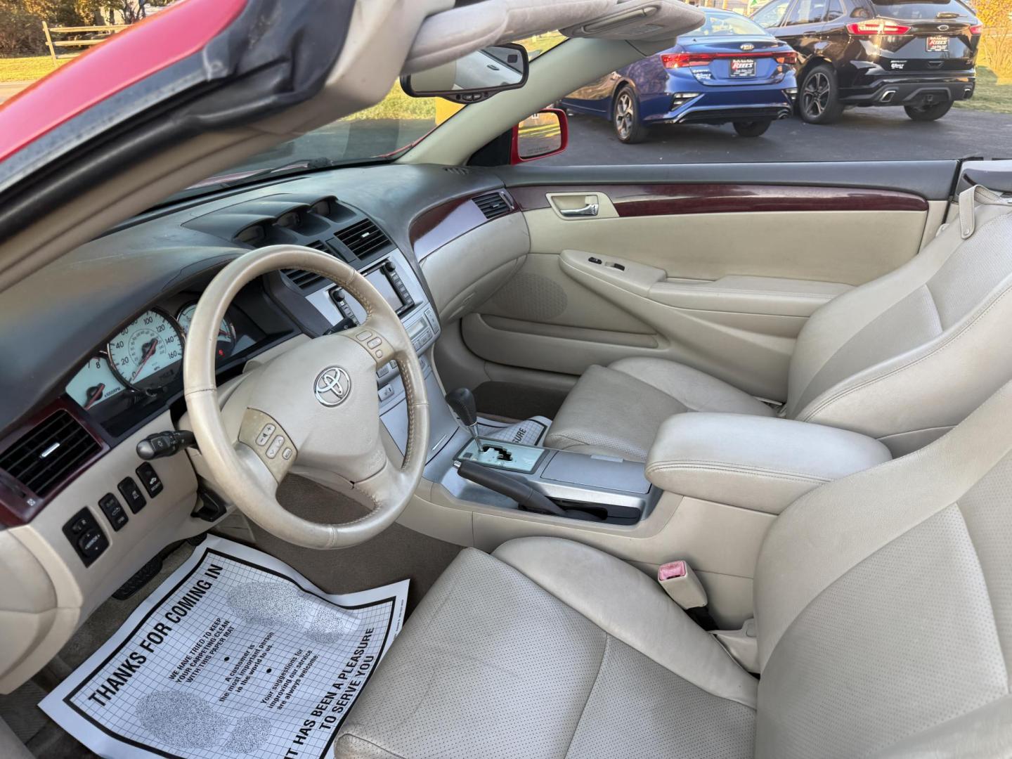 2005 Red /Tan Toyota Camry Solara XSE Convertible (4T1FA38P05U) with an 3.3L V6 DOHC 24V engine, Automatic transmission, located at 11115 Chardon Rd. , Chardon, OH, 44024, (440) 214-9705, 41.580246, -81.241943 - 2005 Toyota Camry Solara XSE – Stylish, Fun, and Loaded with Premium Features Turn heads in this sleek 2005 Toyota Camry Solara XSE. Powered by a smooth 3.3L V6 engine paired with a 5-speed automatic transmission, this sporty convertible offers a thrilling drive with the convenience of a power - Photo#15