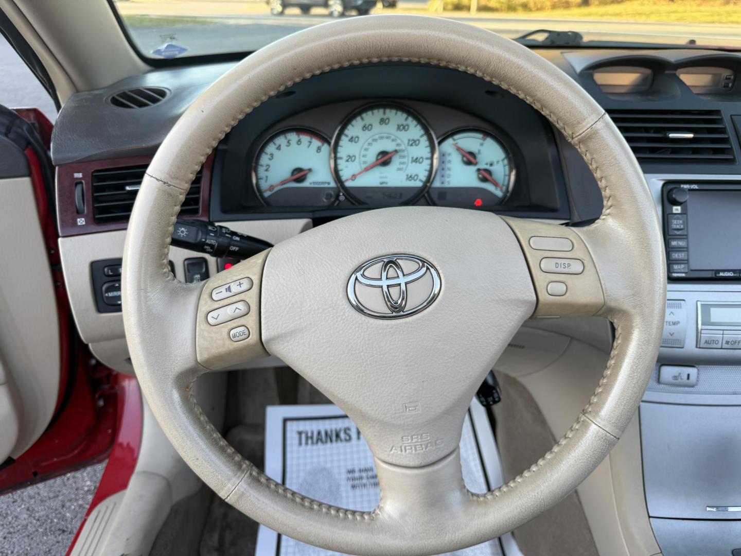 2005 Red /Tan Toyota Camry Solara XSE Convertible (4T1FA38P05U) with an 3.3L V6 DOHC 24V engine, Automatic transmission, located at 11115 Chardon Rd. , Chardon, OH, 44024, (440) 214-9705, 41.580246, -81.241943 - 2005 Toyota Camry Solara XSE – Stylish, Fun, and Loaded with Premium Features Turn heads in this sleek 2005 Toyota Camry Solara XSE. Powered by a smooth 3.3L V6 engine paired with a 5-speed automatic transmission, this sporty convertible offers a thrilling drive with the convenience of a power - Photo#23