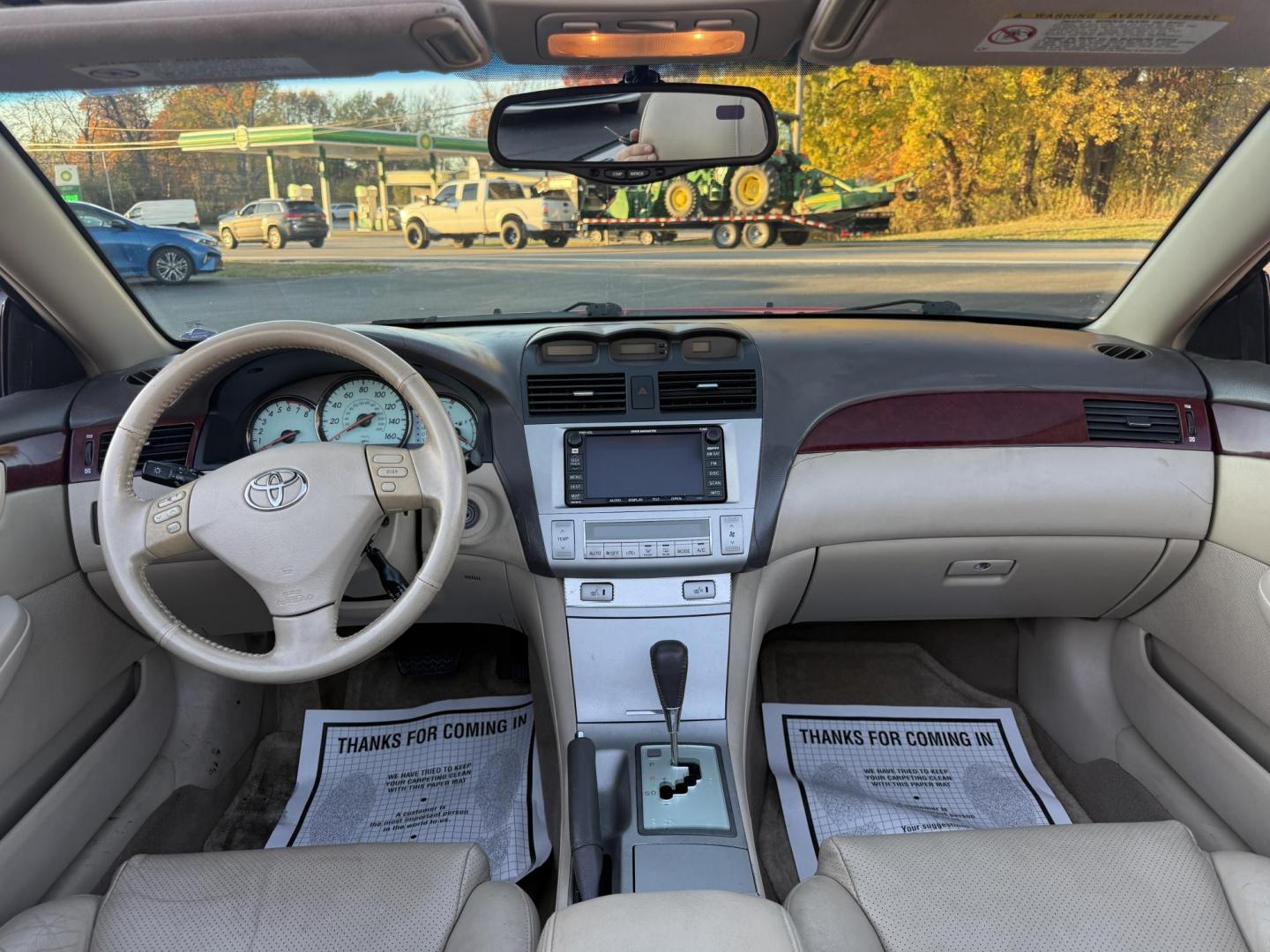 2005 Red /Tan Toyota Camry Solara XSE Convertible (4T1FA38P05U) with an 3.3L V6 DOHC 24V engine, Automatic transmission, located at 11115 Chardon Rd. , Chardon, OH, 44024, (440) 214-9705, 41.580246, -81.241943 - 2005 Toyota Camry Solara XSE – Stylish, Fun, and Loaded with Premium Features Turn heads in this sleek 2005 Toyota Camry Solara XSE. Powered by a smooth 3.3L V6 engine paired with a 5-speed automatic transmission, this sporty convertible offers a thrilling drive with the convenience of a power - Photo#32