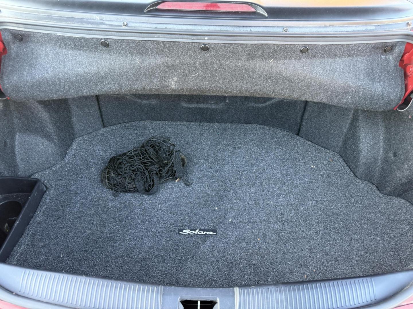 2005 Red /Tan Toyota Camry Solara XSE Convertible (4T1FA38P05U) with an 3.3L V6 DOHC 24V engine, Automatic transmission, located at 11115 Chardon Rd. , Chardon, OH, 44024, (440) 214-9705, 41.580246, -81.241943 - 2005 Toyota Camry Solara XSE – Stylish, Fun, and Loaded with Premium Features Turn heads in this sleek 2005 Toyota Camry Solara XSE. Powered by a smooth 3.3L V6 engine paired with a 5-speed automatic transmission, this sporty convertible offers a thrilling drive with the convenience of a power - Photo#33