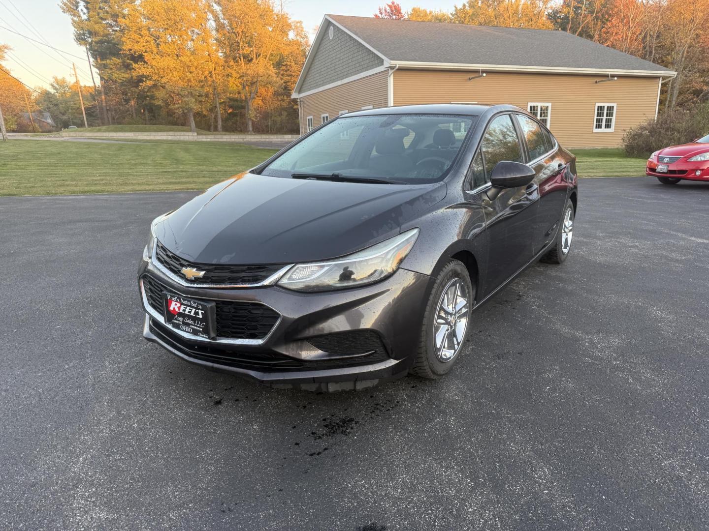 2017 Gray /Black Chevrolet Cruze LT Auto (1G1BE5SMXH7) with an 1.4L I4 DOHC 16V TURBO engine, Automatic transmission, located at 11115 Chardon Rd. , Chardon, OH, 44024, (440) 214-9705, 41.580246, -81.241943 - 2017 Chevrolet Cruze LT – Turbocharged Efficiency, Modern Comfort, and Smart Technology Experience a blend of spirited performance and fuel-saving efficiency in this 2017 Chevrolet Cruze LT. Its 1.4L EcoTec turbocharged engine and 6-speed automatic transmission deliver a fun drive and outstandi - Photo#0