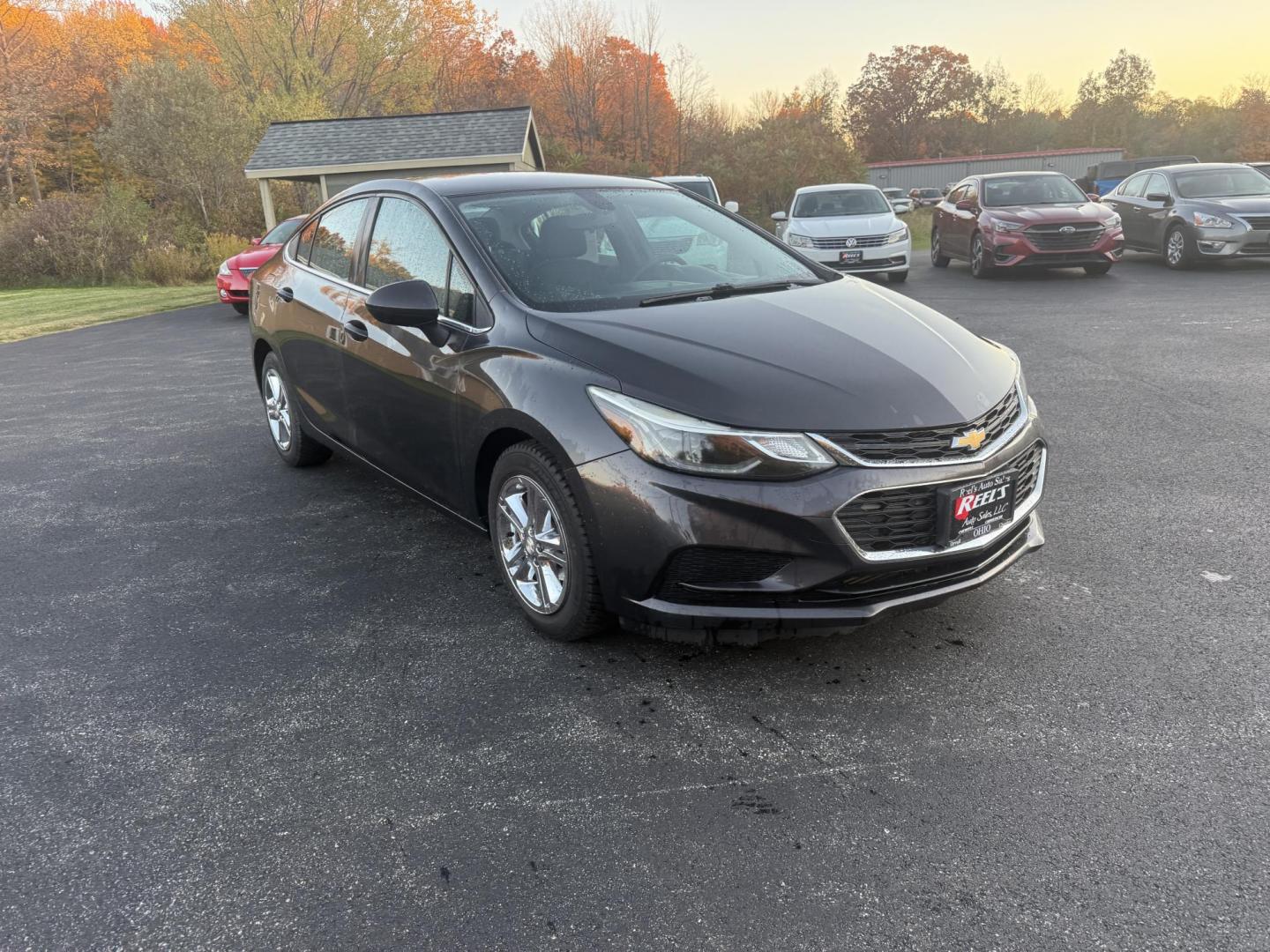2017 Gray /Black Chevrolet Cruze LT Auto (1G1BE5SMXH7) with an 1.4L I4 DOHC 16V TURBO engine, Automatic transmission, located at 11115 Chardon Rd. , Chardon, OH, 44024, (440) 214-9705, 41.580246, -81.241943 - 2017 Chevrolet Cruze LT – Turbocharged Efficiency, Modern Comfort, and Smart Technology Experience a blend of spirited performance and fuel-saving efficiency in this 2017 Chevrolet Cruze LT. Its 1.4L EcoTec turbocharged engine and 6-speed automatic transmission deliver a fun drive and outstandi - Photo#2