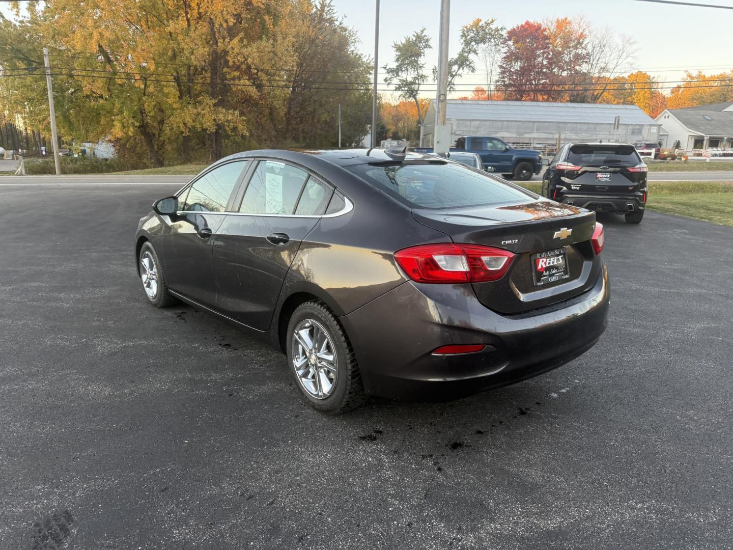 2017 Gray /Black Chevrolet Cruze LT Auto (1G1BE5SMXH7) with an 1.4L I4 DOHC 16V TURBO engine, Automatic transmission, located at 11115 Chardon Rd. , Chardon, OH, 44024, (440) 214-9705, 41.580246, -81.241943 - 2017 Chevrolet Cruze LT – Turbocharged Efficiency, Modern Comfort, and Smart Technology Experience a blend of spirited performance and fuel-saving efficiency in this 2017 Chevrolet Cruze LT. Its 1.4L EcoTec turbocharged engine and 6-speed automatic transmission deliver a fun drive and outstandi - Photo#9