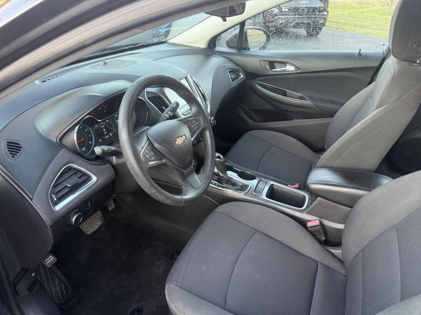 2017 Gray /Black Chevrolet Cruze LT Auto (1G1BE5SMXH7) with an 1.4L I4 DOHC 16V TURBO engine, Automatic transmission, located at 11115 Chardon Rd. , Chardon, OH, 44024, (440) 214-9705, 41.580246, -81.241943 - 2017 Chevrolet Cruze LT – Turbocharged Efficiency, Modern Comfort, and Smart Technology Experience a blend of spirited performance and fuel-saving efficiency in this 2017 Chevrolet Cruze LT. Its 1.4L EcoTec turbocharged engine and 6-speed automatic transmission deliver a fun drive and outstandi - Photo#15