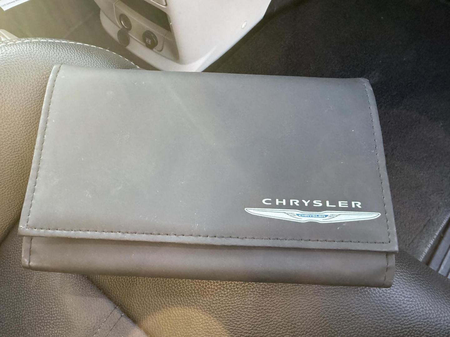 2015 White /Black Chrysler Town & Country Touring (2C4RC1BG7FR) with an 3.6L V6 DOHC 24V FFV engine, Automatic transmission, located at 11115 Chardon Rd. , Chardon, OH, 44024, (440) 214-9705, 41.580246, -81.241943 - Photo#46