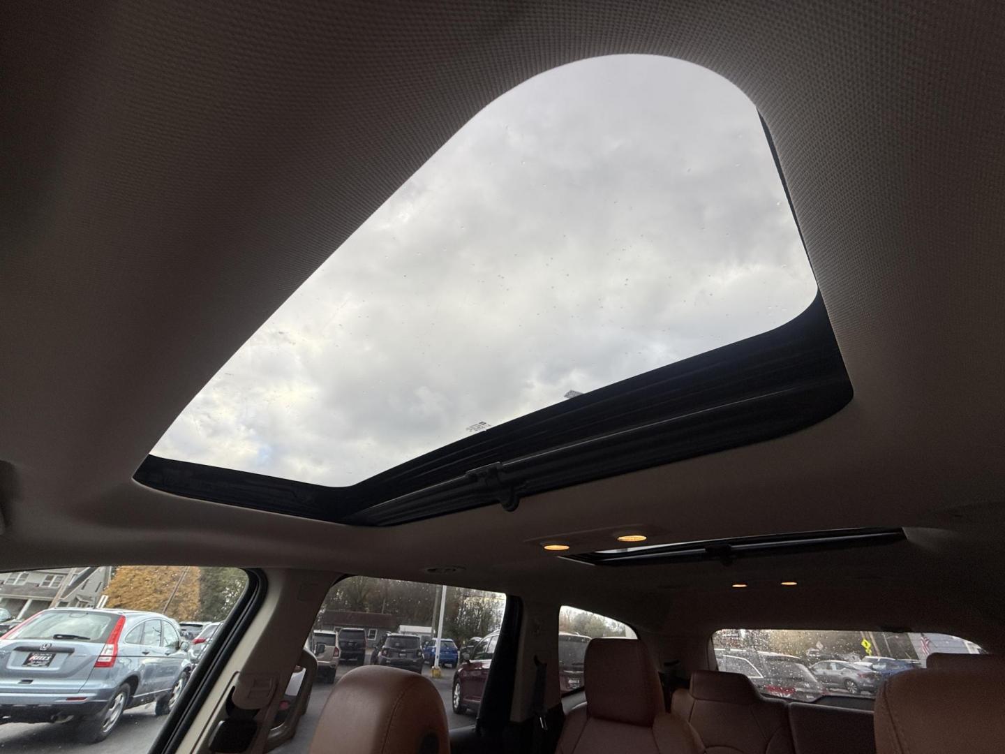 2017 Red /Brown Chevrolet Traverse 2LT AWD (1GNKVHKD3HJ) with an 3.6L V6 DOHC 24V engine, 6A transmission, located at 547 E. Main St., Orwell, OH, 44076, (440) 437-5893, 41.535435, -80.847855 - Photo#33