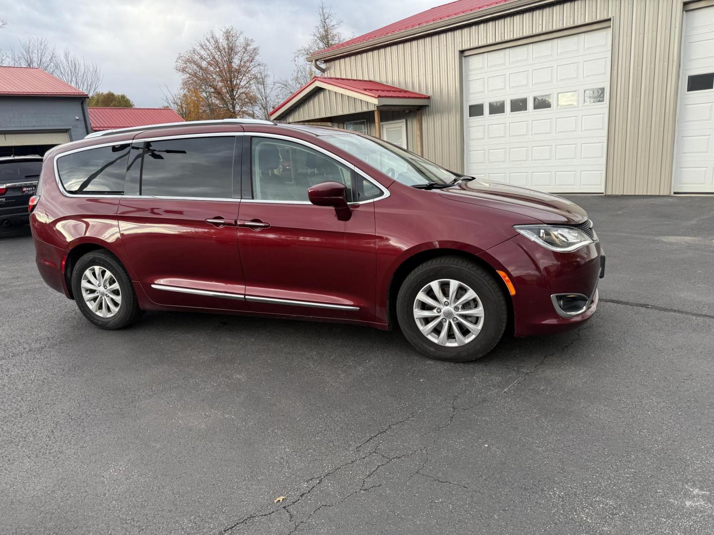 2018 Red /Black Chrysler Pacifica Touring-L Plus (2C4RC1EG7JR) with an 3.6L V6 DOHC 24V engine, Automatic transmission, located at 547 E. Main St., Orwell, OH, 44076, (440) 437-5893, 41.535435, -80.847855 - 2018 Chrysler Pacifica Touring L Plus – Ultimate Family Luxury, Technology, and Versatility Elevate every family adventure in this 2018 Chrysler Pacifica Touring L Plus. Powered by the reliable 3.6L Pentastar V6 engine and a smooth 9-speed automatic transmission, this Pacifica offers up to 28 M - Photo#3
