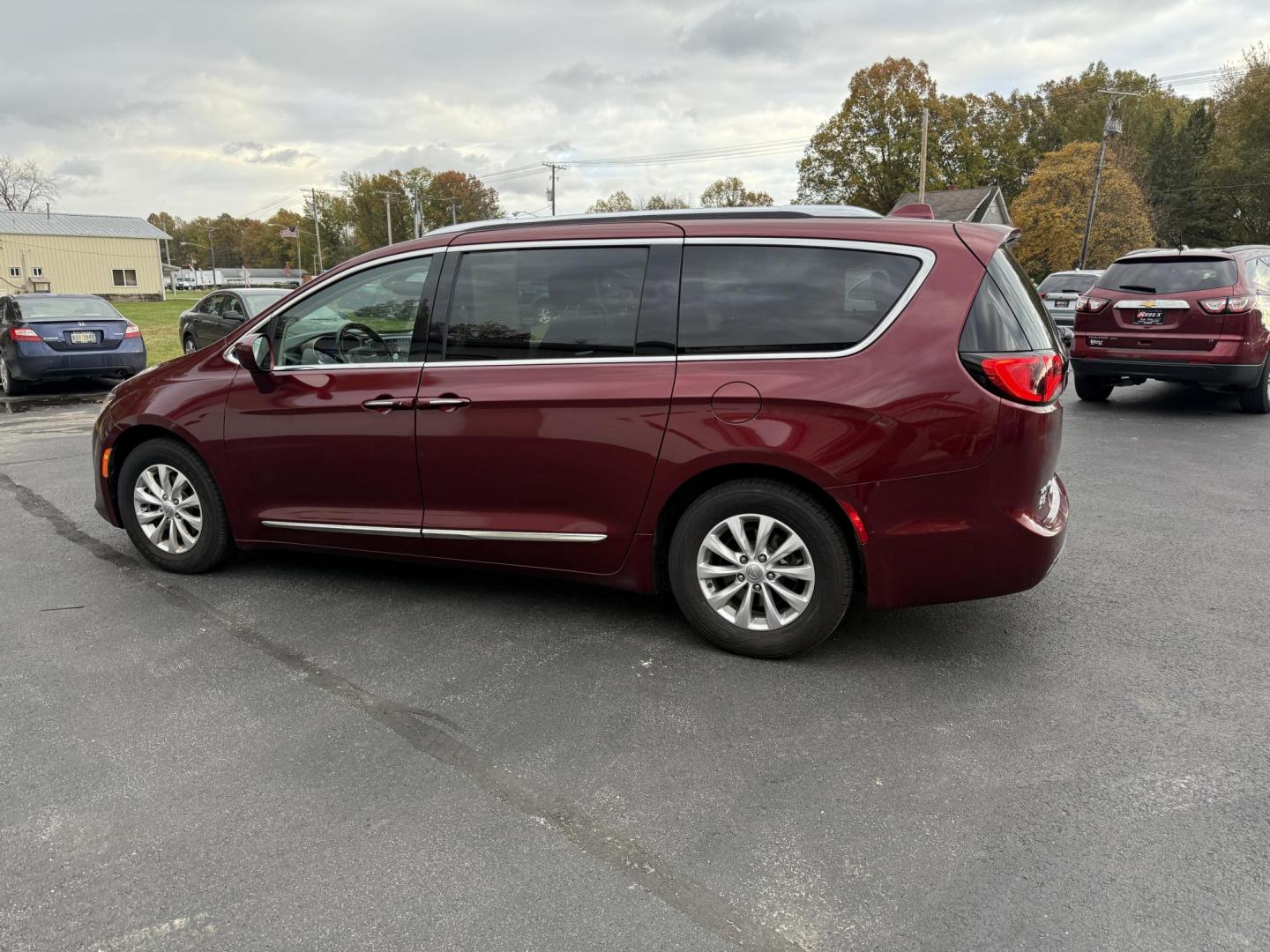 2018 Red /Black Chrysler Pacifica Touring-L Plus (2C4RC1EG7JR) with an 3.6L V6 DOHC 24V engine, Automatic transmission, located at 547 E. Main St., Orwell, OH, 44076, (440) 437-5893, 41.535435, -80.847855 - 2018 Chrysler Pacifica Touring L Plus – Ultimate Family Luxury, Technology, and Versatility Elevate every family adventure in this 2018 Chrysler Pacifica Touring L Plus. Powered by the reliable 3.6L Pentastar V6 engine and a smooth 9-speed automatic transmission, this Pacifica offers up to 28 M - Photo#11