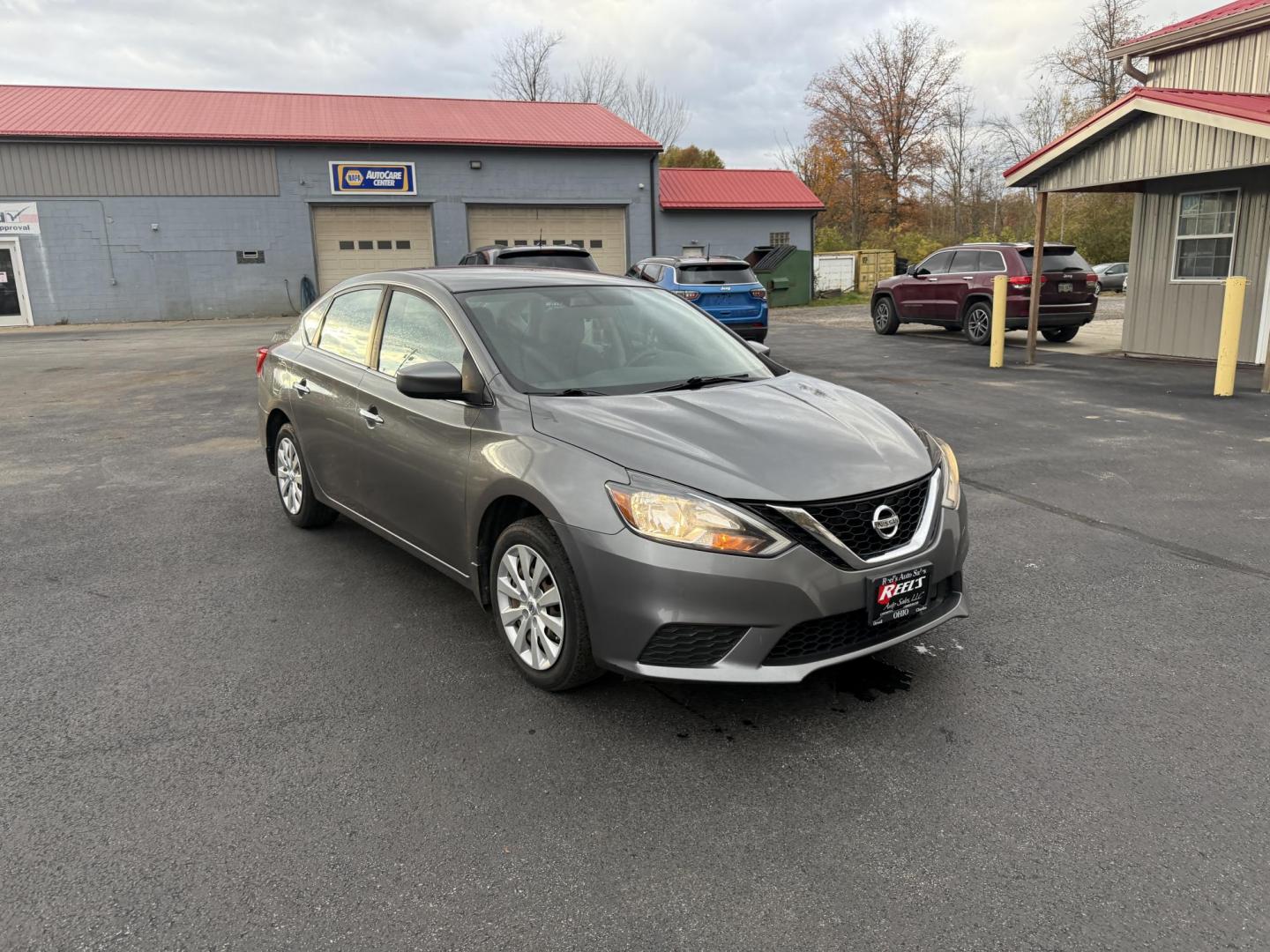 2019 Gray /Black Nissan Sentra S CVT (3N1AB7APXKY) with an 1.8L I4 SFI DOHC 16V engine, Automatic transmission, located at 547 E. Main St., Orwell, OH, 44076, (440) 437-5893, 41.535435, -80.847855 - ONE OWNER – 2019 Nissan Sentra S – Exceptional Efficiency, Modern Tech, and Everyday Confidence Drive smart and save with this 2019 Nissan Sentra S, offering an efficient 1.8L I4 engine that delivers 32 MPG combined and up to 37 MPG highway. With ECO mode, you’ll maximize every mile—perfe - Photo#2