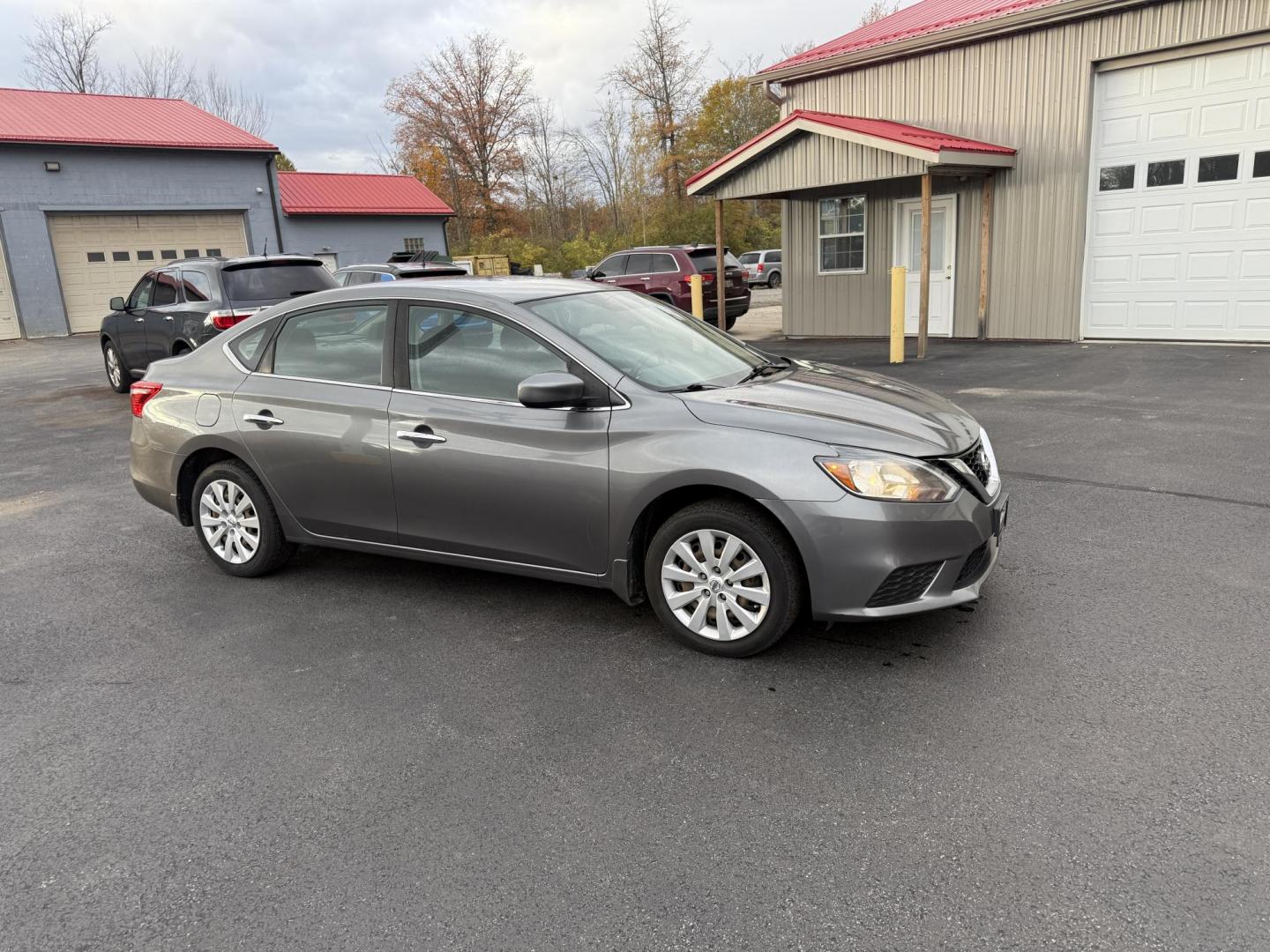 2019 Gray /Black Nissan Sentra S CVT (3N1AB7APXKY) with an 1.8L I4 SFI DOHC 16V engine, Automatic transmission, located at 547 E. Main St., Orwell, OH, 44076, (440) 437-5893, 41.535435, -80.847855 - ONE OWNER – 2019 Nissan Sentra S – Exceptional Efficiency, Modern Tech, and Everyday Confidence Drive smart and save with this 2019 Nissan Sentra S, offering an efficient 1.8L I4 engine that delivers 32 MPG combined and up to 37 MPG highway. With ECO mode, you’ll maximize every mile—perfe - Photo#3