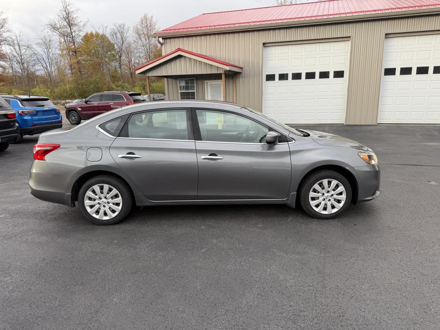 2019 Gray /Black Nissan Sentra S CVT (3N1AB7APXKY) with an 1.8L I4 SFI DOHC 16V engine, Automatic transmission, located at 547 E. Main St., Orwell, OH, 44076, (440) 437-5893, 41.535435, -80.847855 - ONE OWNER – 2019 Nissan Sentra S – Exceptional Efficiency, Modern Tech, and Everyday Confidence Drive smart and save with this 2019 Nissan Sentra S, offering an efficient 1.8L I4 engine that delivers 32 MPG combined and up to 37 MPG highway. With ECO mode, you’ll maximize every mile—perfe - Photo#5