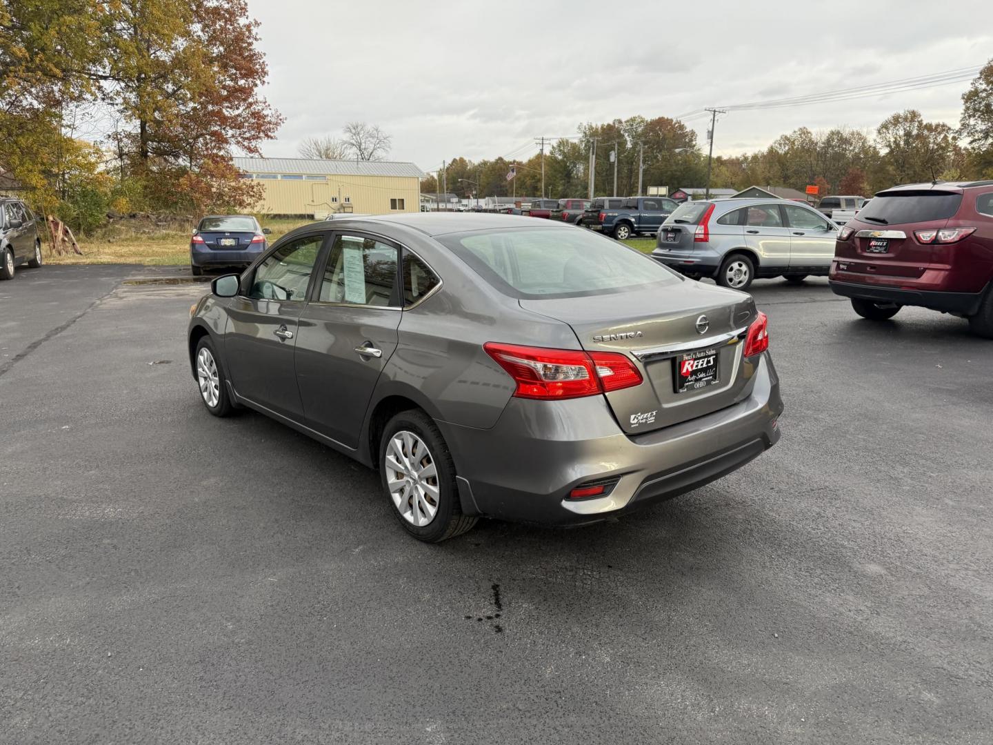 2019 Gray /Black Nissan Sentra S CVT (3N1AB7APXKY) with an 1.8L I4 SFI DOHC 16V engine, Automatic transmission, located at 547 E. Main St., Orwell, OH, 44076, (440) 437-5893, 41.535435, -80.847855 - ONE OWNER – 2019 Nissan Sentra S – Exceptional Efficiency, Modern Tech, and Everyday Confidence Drive smart and save with this 2019 Nissan Sentra S, offering an efficient 1.8L I4 engine that delivers 32 MPG combined and up to 37 MPG highway. With ECO mode, you’ll maximize every mile—perfe - Photo#9