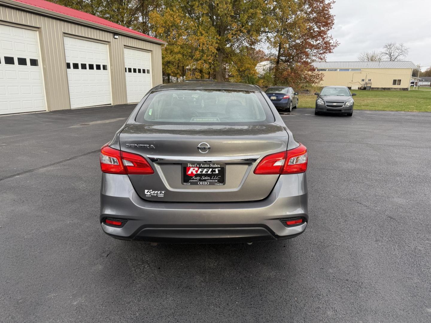 2019 Gray /Black Nissan Sentra S CVT (3N1AB7APXKY) with an 1.8L I4 SFI DOHC 16V engine, Automatic transmission, located at 547 E. Main St., Orwell, OH, 44076, (440) 437-5893, 41.535435, -80.847855 - ONE OWNER – 2019 Nissan Sentra S – Exceptional Efficiency, Modern Tech, and Everyday Confidence Drive smart and save with this 2019 Nissan Sentra S, offering an efficient 1.8L I4 engine that delivers 32 MPG combined and up to 37 MPG highway. With ECO mode, you’ll maximize every mile—perfe - Photo#8