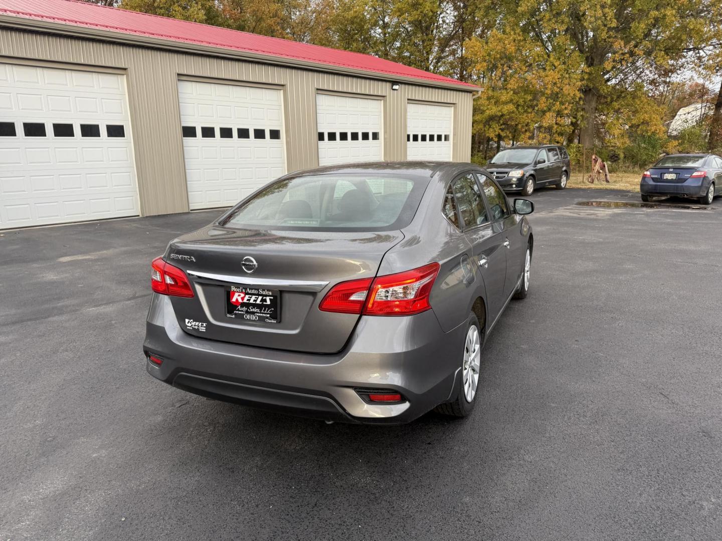 2019 Gray /Black Nissan Sentra S CVT (3N1AB7APXKY) with an 1.8L I4 SFI DOHC 16V engine, Automatic transmission, located at 547 E. Main St., Orwell, OH, 44076, (440) 437-5893, 41.535435, -80.847855 - ONE OWNER – 2019 Nissan Sentra S – Exceptional Efficiency, Modern Tech, and Everyday Confidence Drive smart and save with this 2019 Nissan Sentra S, offering an efficient 1.8L I4 engine that delivers 32 MPG combined and up to 37 MPG highway. With ECO mode, you’ll maximize every mile—perfe - Photo#7
