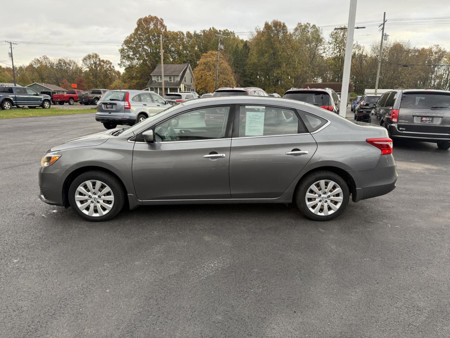 2019 Gray /Black Nissan Sentra S CVT (3N1AB7APXKY) with an 1.8L I4 SFI DOHC 16V engine, Automatic transmission, located at 547 E. Main St., Orwell, OH, 44076, (440) 437-5893, 41.535435, -80.847855 - ONE OWNER – 2019 Nissan Sentra S – Exceptional Efficiency, Modern Tech, and Everyday Confidence Drive smart and save with this 2019 Nissan Sentra S, offering an efficient 1.8L I4 engine that delivers 32 MPG combined and up to 37 MPG highway. With ECO mode, you’ll maximize every mile—perfe - Photo#12