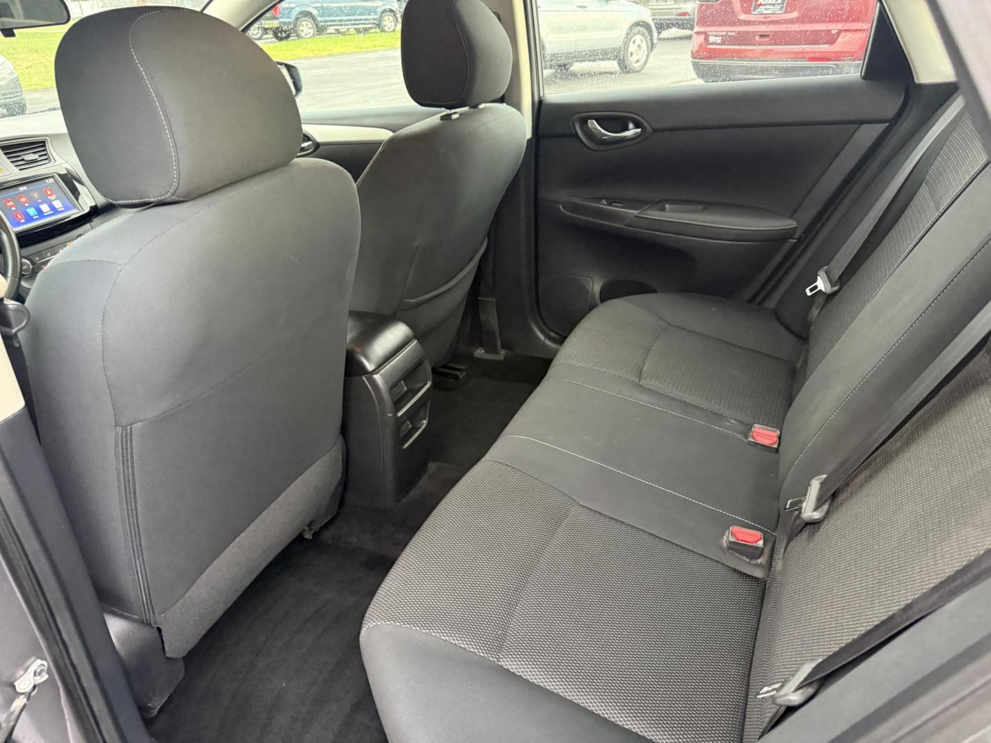 2019 Gray /Black Nissan Sentra S CVT (3N1AB7APXKY) with an 1.8L I4 SFI DOHC 16V engine, Automatic transmission, located at 547 E. Main St., Orwell, OH, 44076, (440) 437-5893, 41.535435, -80.847855 - ONE OWNER – 2019 Nissan Sentra S – Exceptional Efficiency, Modern Tech, and Everyday Confidence Drive smart and save with this 2019 Nissan Sentra S, offering an efficient 1.8L I4 engine that delivers 32 MPG combined and up to 37 MPG highway. With ECO mode, you’ll maximize every mile—perfe - Photo#28