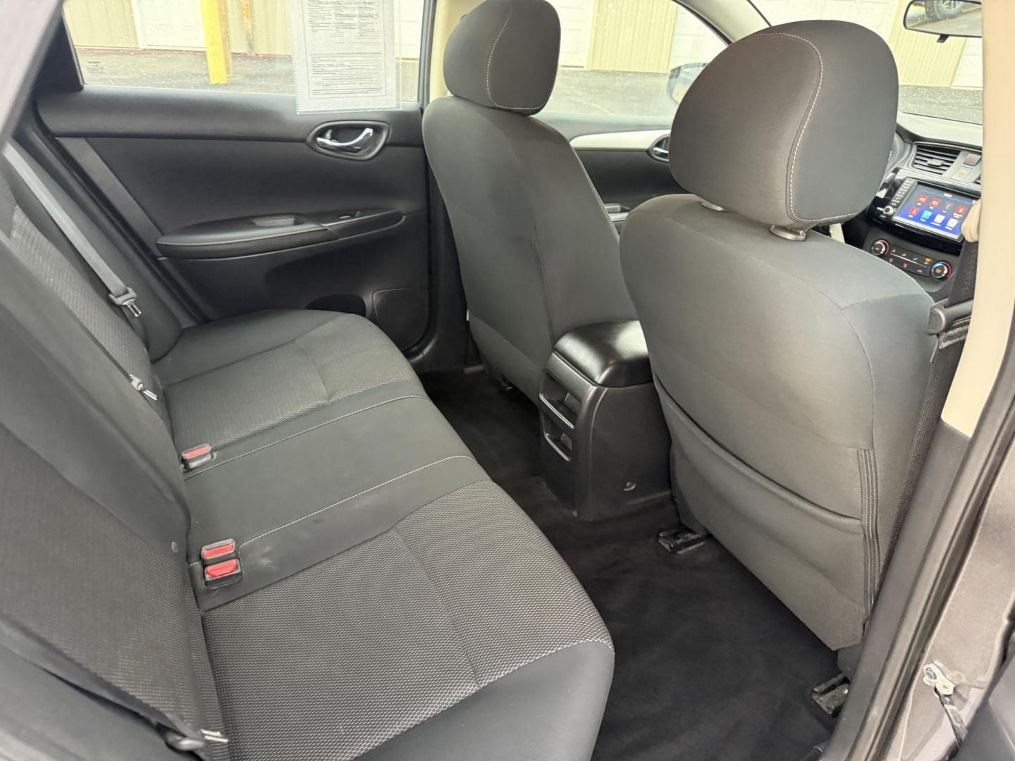 2019 Gray /Black Nissan Sentra S CVT (3N1AB7APXKY) with an 1.8L I4 SFI DOHC 16V engine, Automatic transmission, located at 547 E. Main St., Orwell, OH, 44076, (440) 437-5893, 41.535435, -80.847855 - ONE OWNER – 2019 Nissan Sentra S – Exceptional Efficiency, Modern Tech, and Everyday Confidence Drive smart and save with this 2019 Nissan Sentra S, offering an efficient 1.8L I4 engine that delivers 32 MPG combined and up to 37 MPG highway. With ECO mode, you’ll maximize every mile—perfe - Photo#33