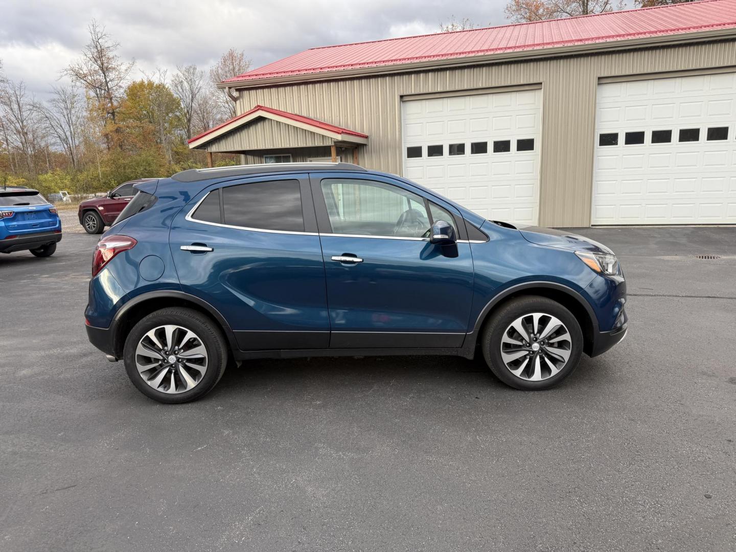 2019 Blue /Tan Buick Encore Essence AWD (KL4CJGSM7KB) with an 1.4L I4 DOHC 16V TURBO engine, Automatic transmission, located at 547 E. Main St., Orwell, OH, 44076, (440) 437-5893, 41.535435, -80.847855 - 2019 Buick Encore Essence AWD – Luxury, Comfort, and Advanced Safety in a Compact SUV Step up to refined driving in this 2019 Buick Encore Essence AWD. Powered by a fuel-efficient 1.4L EcoTec turbocharged engine and 6-speed automatic transmission, this Encore delivers peppy performance and up t - Photo#5