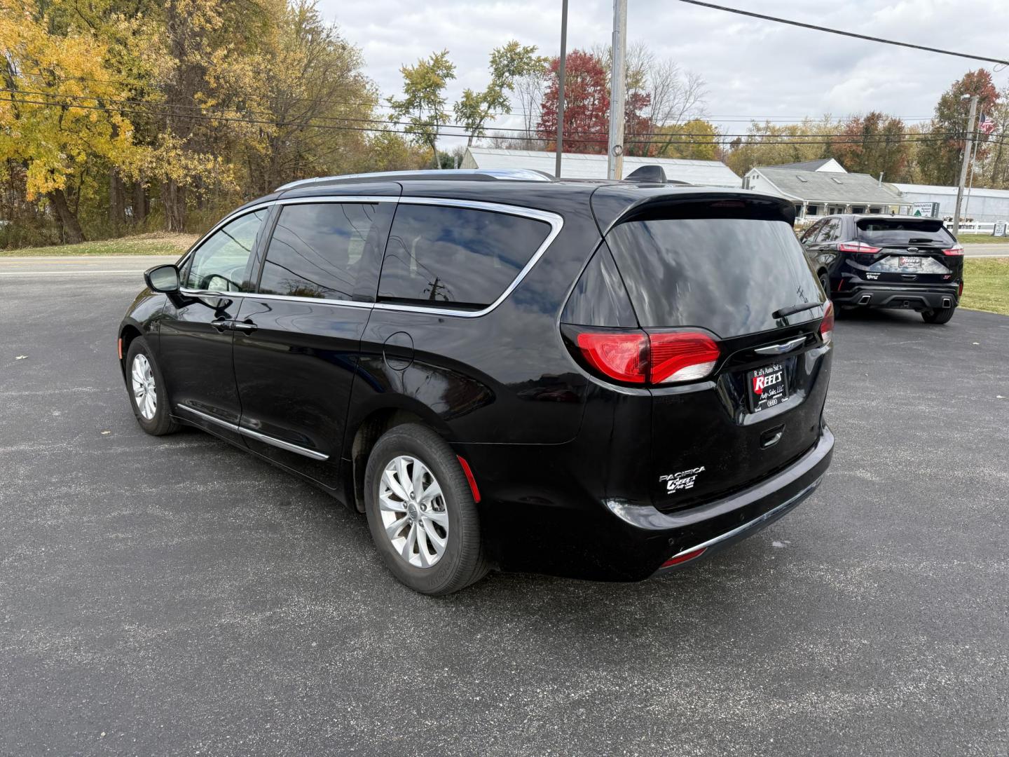 2018 Black /Black Chrysler Pacifica Touring-L (2C4RC1BG8JR) with an 3.6L V6 DOHC 24V engine, Automatic transmission, located at 11115 Chardon Rd. , Chardon, OH, 44024, (440) 214-9705, 41.580246, -81.241943 - Photo#9