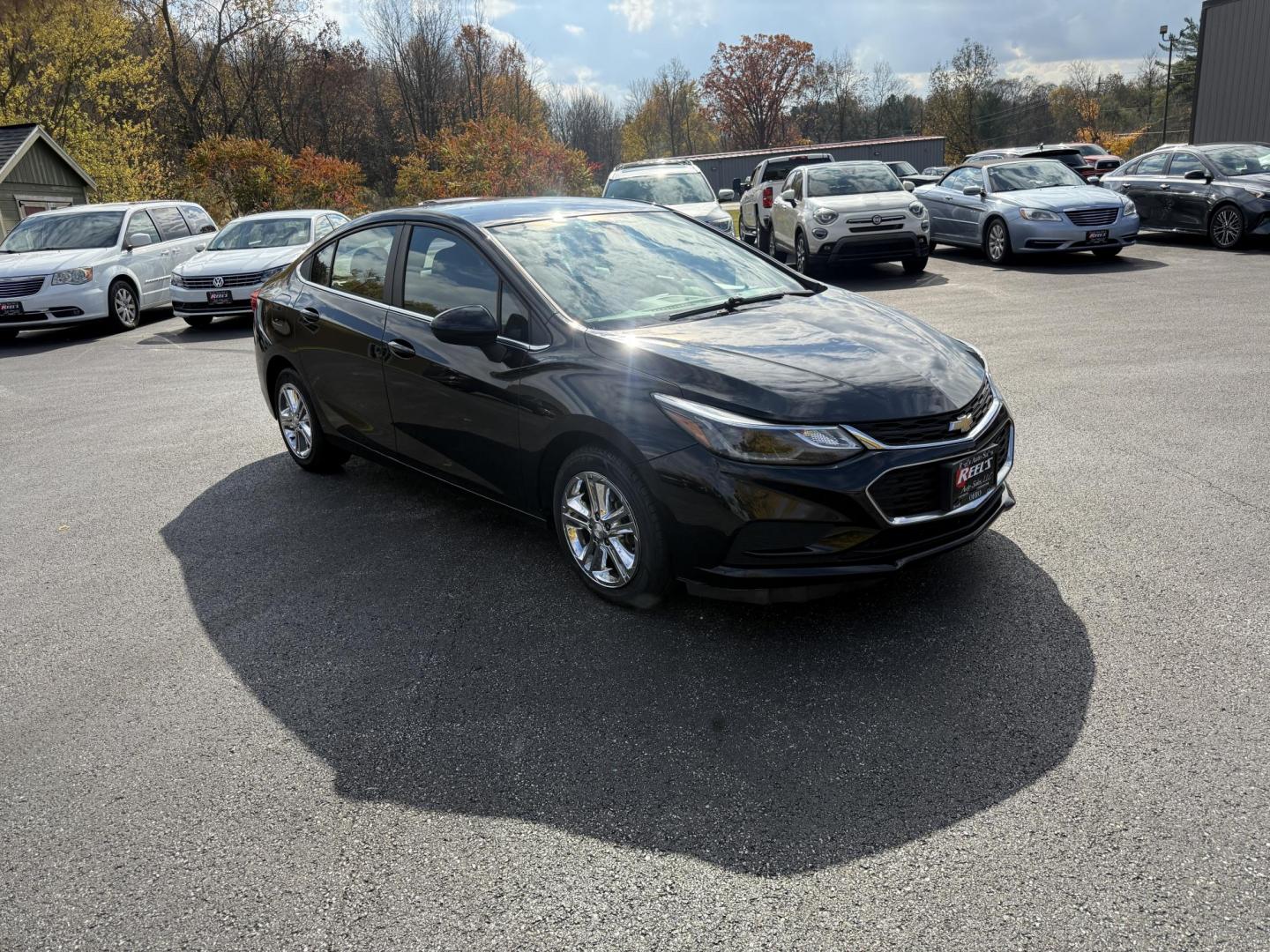 2017 Black /Black Chevrolet Cruze LT Auto (1G1BE5SM6H7) with an 1.4L I4 DOHC 16V TURBO engine, Automatic transmission, located at 11115 Chardon Rd. , Chardon, OH, 44024, (440) 214-9705, 41.580246, -81.241943 - 2017 Chevrolet Cruze LT Auto – Efficient, Stylish, and Tech-Ready Drive with confidence in this 2017 Chevrolet Cruze LT Auto, featuring a turbocharged 1.4L EcoTec engine paired with a smooth 6-speed automatic transmission. Enjoy impressive fuel efficiency with up to 34 MPG combined and 40 MPG h - Photo#2