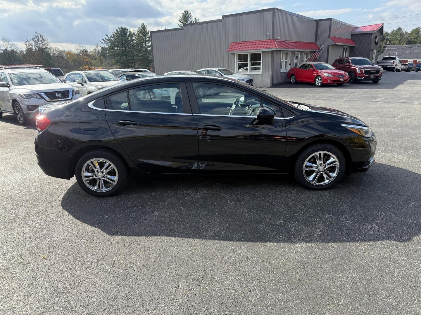 2017 Black /Black Chevrolet Cruze LT Auto (1G1BE5SM6H7) with an 1.4L I4 DOHC 16V TURBO engine, Automatic transmission, located at 11115 Chardon Rd. , Chardon, OH, 44024, (440) 214-9705, 41.580246, -81.241943 - 2017 Chevrolet Cruze LT Auto – Efficient, Stylish, and Tech-Ready Drive with confidence in this 2017 Chevrolet Cruze LT Auto, featuring a turbocharged 1.4L EcoTec engine paired with a smooth 6-speed automatic transmission. Enjoy impressive fuel efficiency with up to 34 MPG combined and 40 MPG h - Photo#5
