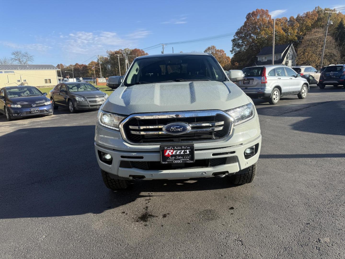2021 Gray /Black Ford Ranger Lariat SuperCrew 4WD (1FTER4FHXML) with an 2.3L I4 DOHC 16V Turbo engine, Automatic transmission, located at 547 E. Main St., Orwell, OH, 44076, (440) 437-5893, 41.535435, -80.847855 - One Owner – 2021 Ford Ranger Lariat Crew Cab – Off-Road Capability Meets Modern Luxury Tackle every journey in comfort and style with this 2021 Ford Ranger Lariat Crew Cab. Powered by a turbocharged 2.3L EcoBoost engine and a 10-speed automatic transmission, this truck delivers efficient powe - Photo#1