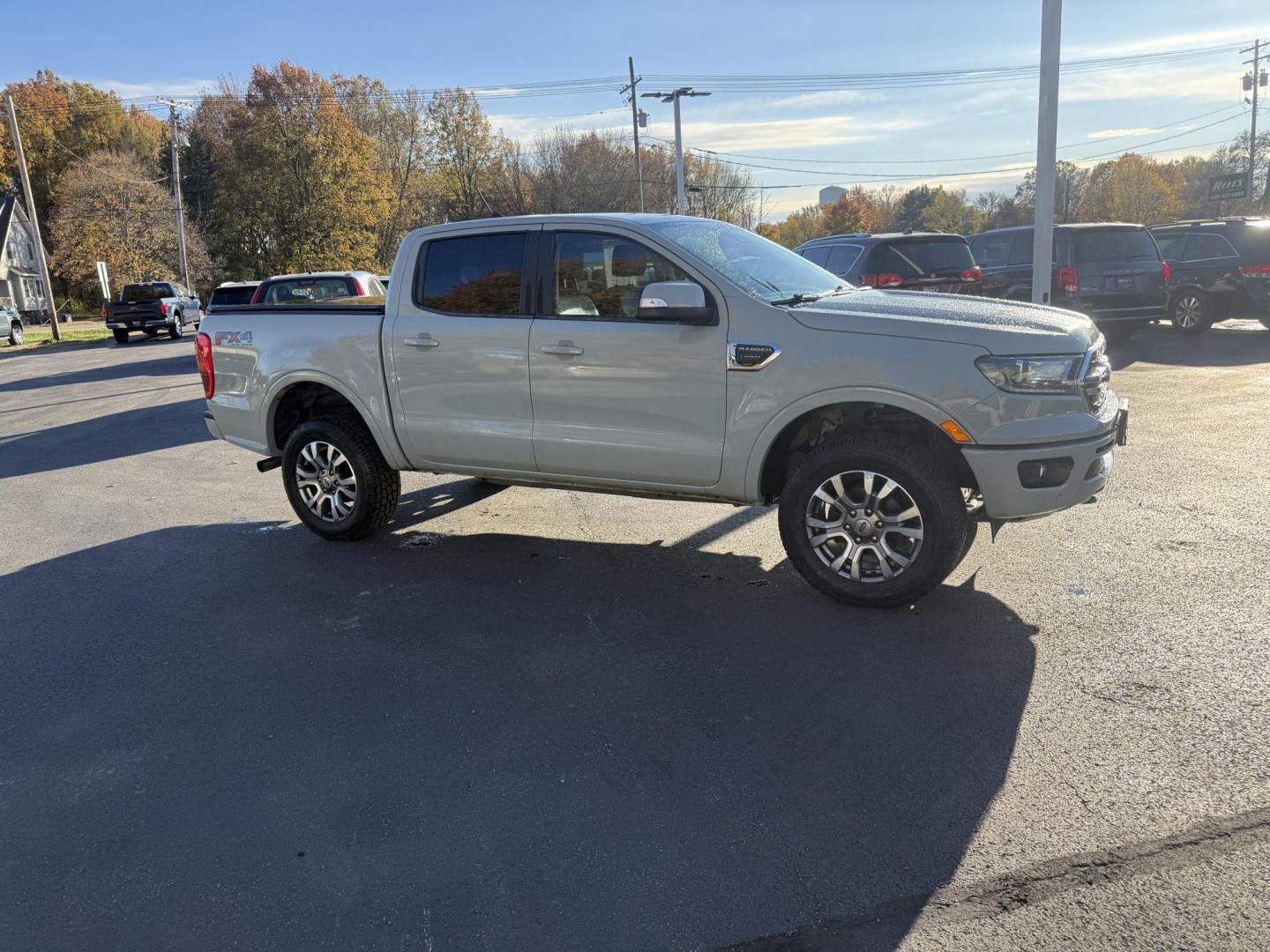 2021 Gray /Black Ford Ranger Lariat SuperCrew 4WD (1FTER4FHXML) with an 2.3L I4 DOHC 16V Turbo engine, Automatic transmission, located at 547 E. Main St., Orwell, OH, 44076, (440) 437-5893, 41.535435, -80.847855 - One Owner – 2021 Ford Ranger Lariat Crew Cab – Off-Road Capability Meets Modern Luxury Tackle every journey in comfort and style with this 2021 Ford Ranger Lariat Crew Cab. Powered by a turbocharged 2.3L EcoBoost engine and a 10-speed automatic transmission, this truck delivers efficient powe - Photo#3