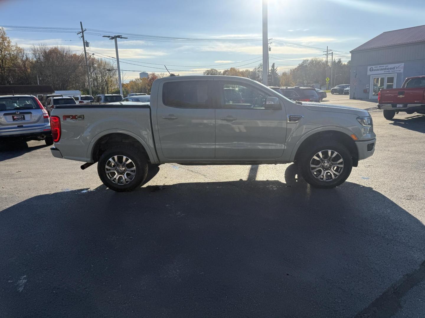 2021 Gray /Black Ford Ranger Lariat SuperCrew 4WD (1FTER4FHXML) with an 2.3L I4 DOHC 16V Turbo engine, Automatic transmission, located at 547 E. Main St., Orwell, OH, 44076, (440) 437-5893, 41.535435, -80.847855 - One Owner – 2021 Ford Ranger Lariat Crew Cab – Off-Road Capability Meets Modern Luxury Tackle every journey in comfort and style with this 2021 Ford Ranger Lariat Crew Cab. Powered by a turbocharged 2.3L EcoBoost engine and a 10-speed automatic transmission, this truck delivers efficient powe - Photo#6