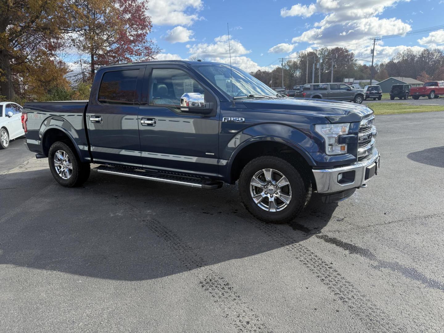 2015 Blue /Black Ford F-150 Lariat SuperCrew 5.5-ft. Bed 4WD (1FTEW1EG2FF) with an 3.5L V6 TWIN TURBO engine, 6-Speed Automatic transmission, located at 547 E. Main St., Orwell, OH, 44076, (440) 437-5893, 41.535435, -80.847855 - 2015 Ford F-150 Lariat Crew Cab – Power, Luxury, and Advanced Capability Experience top-tier performance and premium comfort with this 2015 Ford F-150 Lariat Crew Cab. Under the hood, the powerful 3.5L Twin Turbo EcoBoost engine delivers an impressive 365 horsepower and 420 lb-ft of torque, pai - Photo#3
