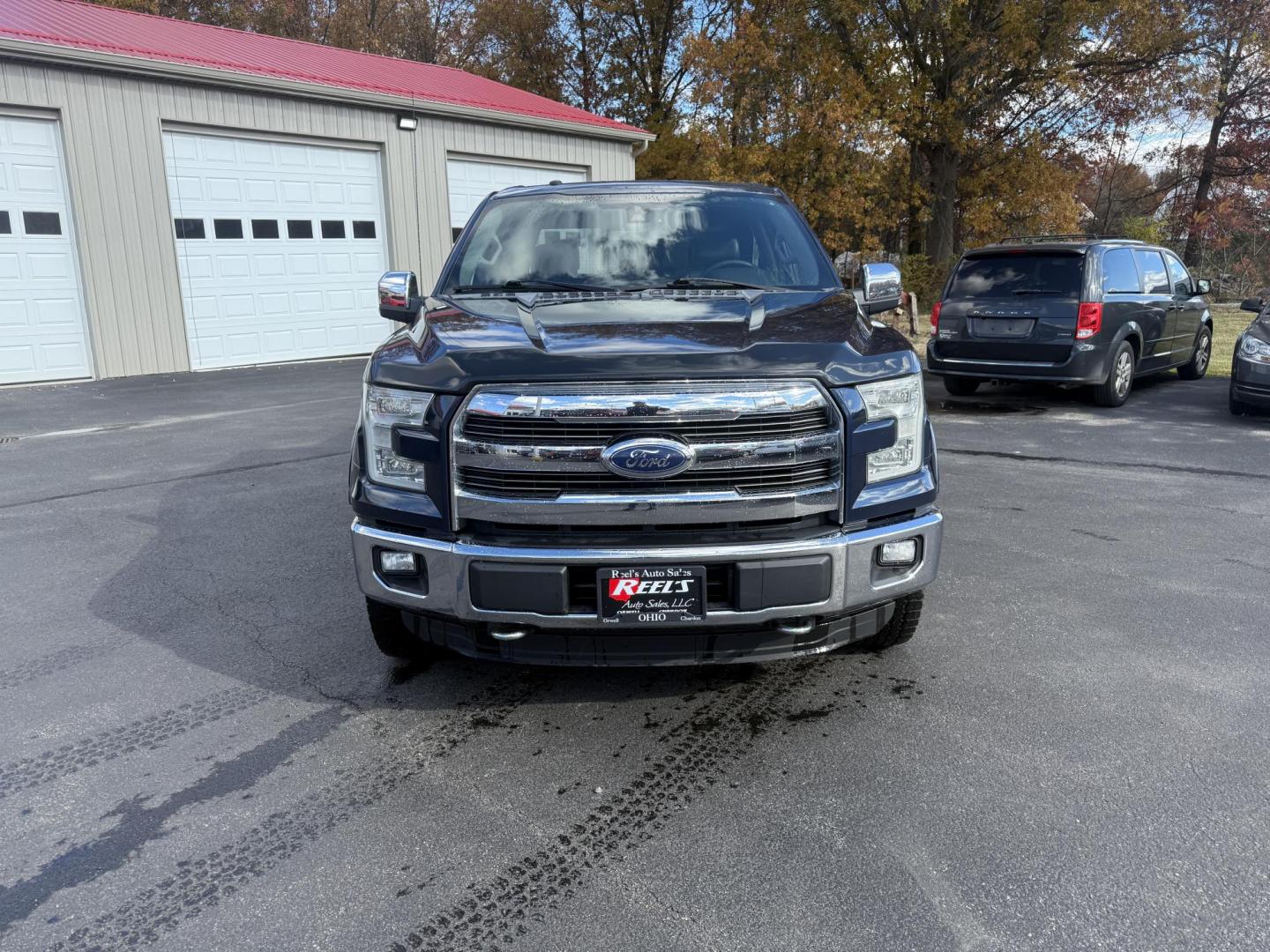 2015 Blue /Black Ford F-150 Lariat SuperCrew 5.5-ft. Bed 4WD (1FTEW1EG2FF) with an 3.5L V6 TWIN TURBO engine, 6-Speed Automatic transmission, located at 547 E. Main St., Orwell, OH, 44076, (440) 437-5893, 41.535435, -80.847855 - 2015 Ford F-150 Lariat Crew Cab – Power, Luxury, and Advanced Capability Experience top-tier performance and premium comfort with this 2015 Ford F-150 Lariat Crew Cab. Under the hood, the powerful 3.5L Twin Turbo EcoBoost engine delivers an impressive 365 horsepower and 420 lb-ft of torque, pai - Photo#1