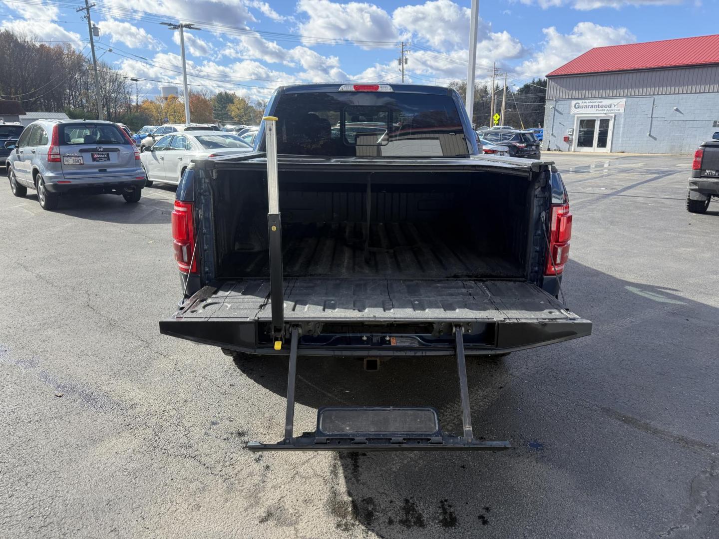2015 Blue /Black Ford F-150 Lariat SuperCrew 5.5-ft. Bed 4WD (1FTEW1EG2FF) with an 3.5L V6 TWIN TURBO engine, 6-Speed Automatic transmission, located at 547 E. Main St., Orwell, OH, 44076, (440) 437-5893, 41.535435, -80.847855 - 2015 Ford F-150 Lariat Crew Cab – Power, Luxury, and Advanced Capability Experience top-tier performance and premium comfort with this 2015 Ford F-150 Lariat Crew Cab. Under the hood, the powerful 3.5L Twin Turbo EcoBoost engine delivers an impressive 365 horsepower and 420 lb-ft of torque, pai - Photo#10