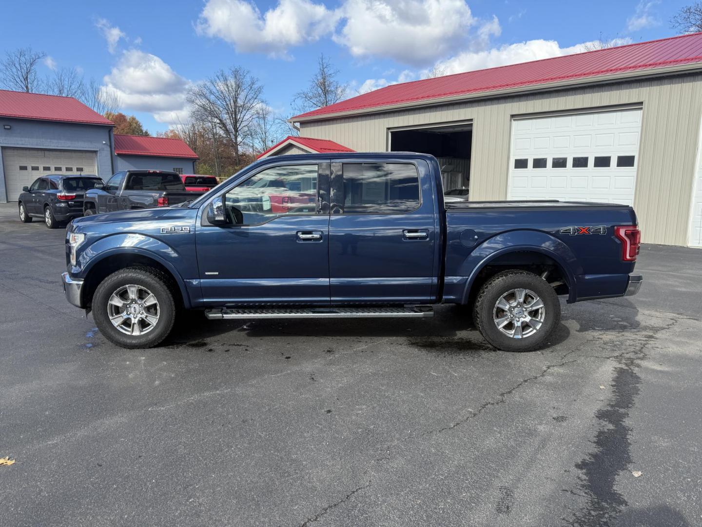 2015 Blue /Black Ford F-150 Lariat SuperCrew 5.5-ft. Bed 4WD (1FTEW1EG2FF) with an 3.5L V6 TWIN TURBO engine, 6-Speed Automatic transmission, located at 547 E. Main St., Orwell, OH, 44076, (440) 437-5893, 41.535435, -80.847855 - 2015 Ford F-150 Lariat Crew Cab – Power, Luxury, and Advanced Capability Experience top-tier performance and premium comfort with this 2015 Ford F-150 Lariat Crew Cab. Under the hood, the powerful 3.5L Twin Turbo EcoBoost engine delivers an impressive 365 horsepower and 420 lb-ft of torque, pai - Photo#14
