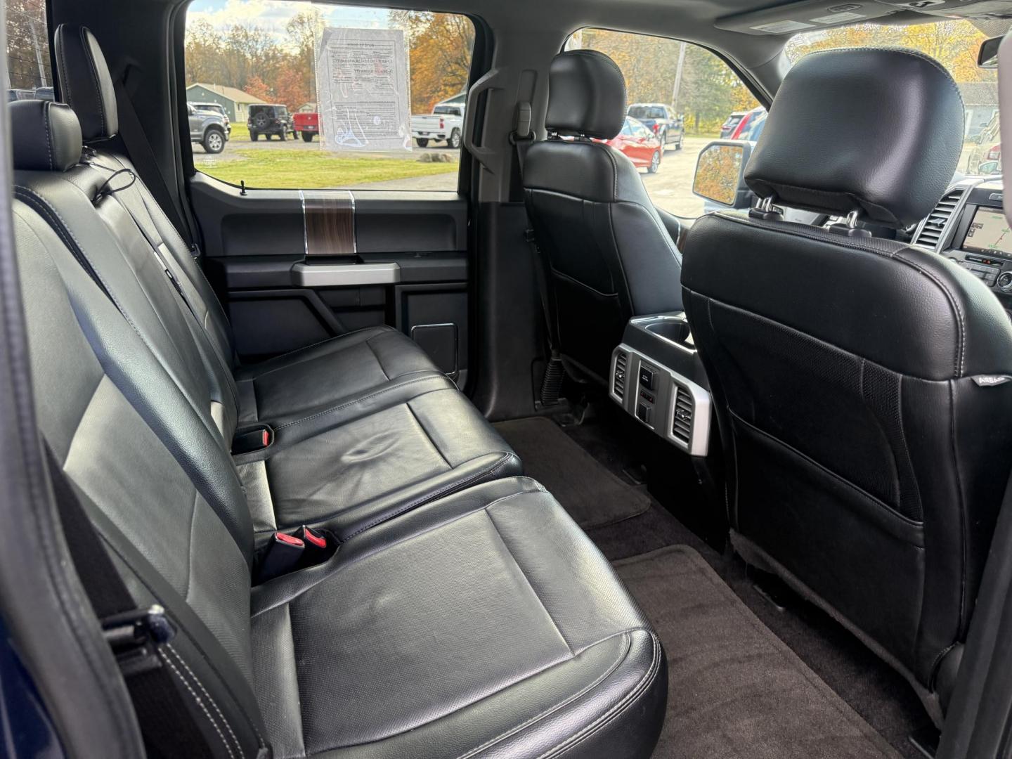 2015 Blue /Black Ford F-150 Lariat SuperCrew 5.5-ft. Bed 4WD (1FTEW1EG2FF) with an 3.5L V6 TWIN TURBO engine, 6-Speed Automatic transmission, located at 547 E. Main St., Orwell, OH, 44076, (440) 437-5893, 41.535435, -80.847855 - 2015 Ford F-150 Lariat Crew Cab – Power, Luxury, and Advanced Capability Experience top-tier performance and premium comfort with this 2015 Ford F-150 Lariat Crew Cab. Under the hood, the powerful 3.5L Twin Turbo EcoBoost engine delivers an impressive 365 horsepower and 420 lb-ft of torque, pai - Photo#49