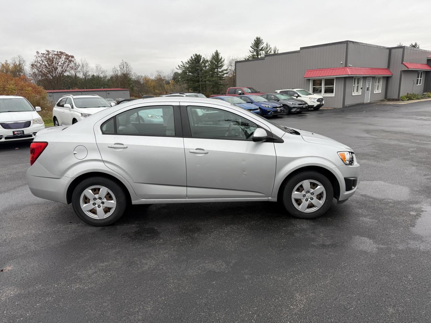 2016 Silver /Gray Chevrolet Sonic LS Auto Sedan (1G1JA5SG7G4) with an 1.8L I4 DOHC 24V engine, Automatic transmission, located at 11115 Chardon Rd. , Chardon, OH, 44024, (440) 214-9705, 41.580246, -81.241943 - One Owner – 2016 Chevrolet Sonic LS Sedan – Efficient, Stylish, and Ready to Drive Discover the perfect balance of economy and style with this 2016 Chevrolet Sonic LS Sedan. Powered by a reliable 1.8L I4 EcoTec engine and paired with a smooth 6-speed automatic transmission, this compact sedan - Photo#5