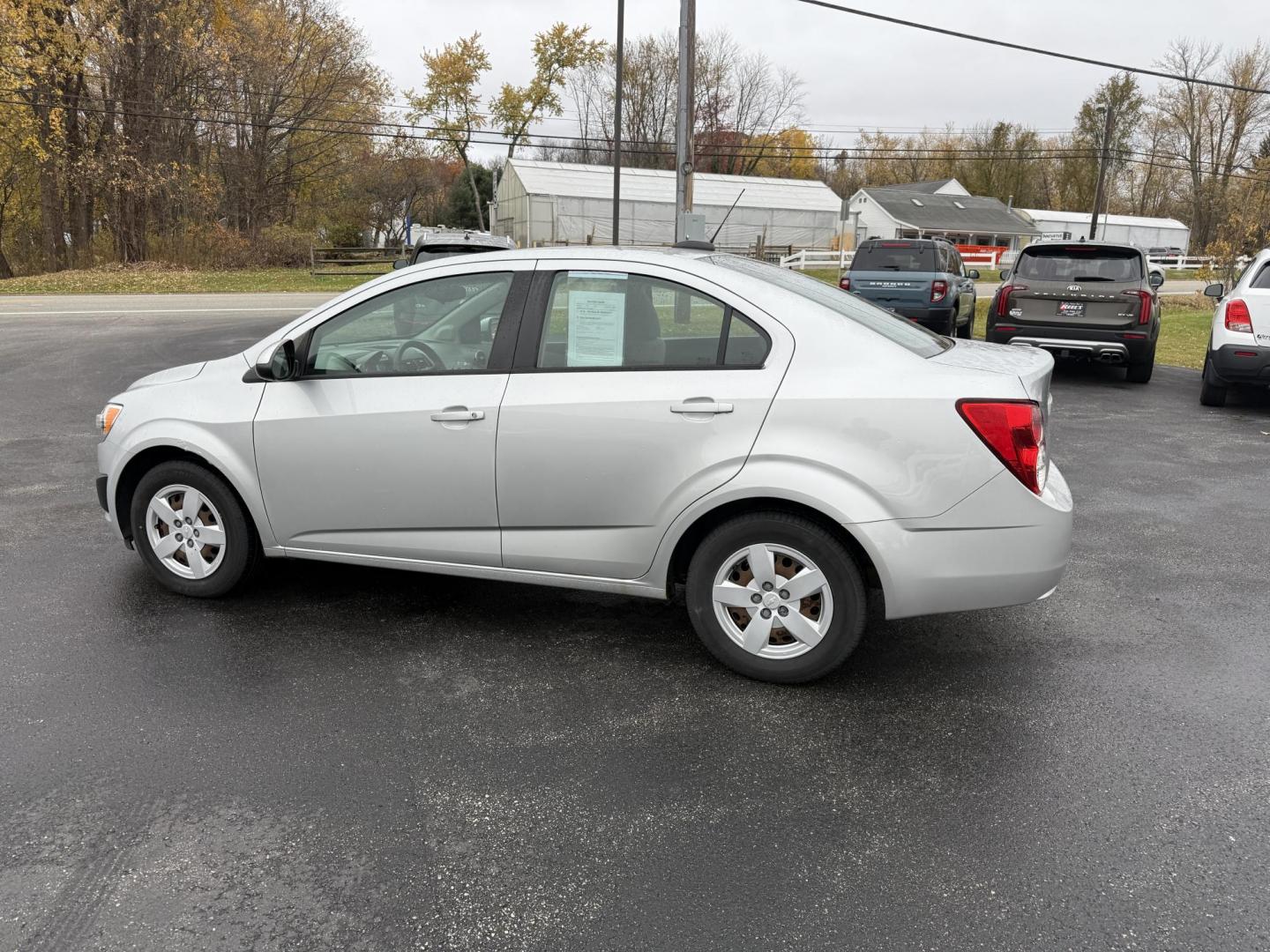 2016 Silver /Gray Chevrolet Sonic LS Auto Sedan (1G1JA5SG7G4) with an 1.8L I4 DOHC 24V engine, Automatic transmission, located at 11115 Chardon Rd. , Chardon, OH, 44024, (440) 214-9705, 41.580246, -81.241943 - One Owner – 2016 Chevrolet Sonic LS Sedan – Efficient, Stylish, and Ready to Drive Discover the perfect balance of economy and style with this 2016 Chevrolet Sonic LS Sedan. Powered by a reliable 1.8L I4 EcoTec engine and paired with a smooth 6-speed automatic transmission, this compact sedan - Photo#10