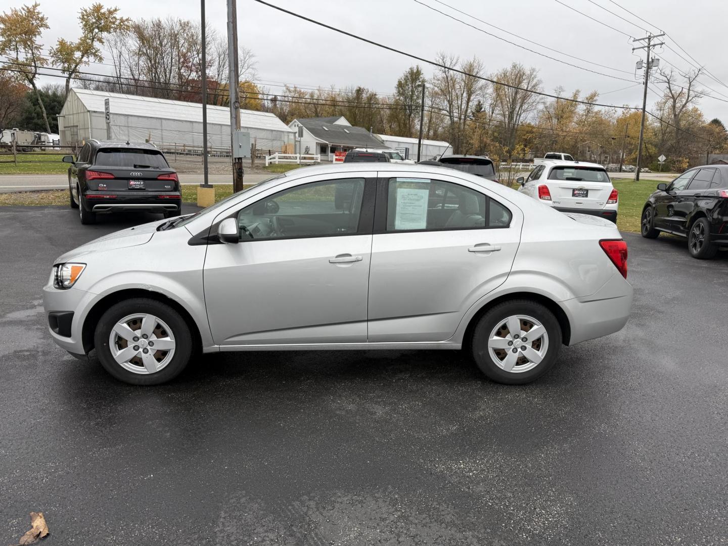 2016 Silver /Gray Chevrolet Sonic LS Auto Sedan (1G1JA5SG7G4) with an 1.8L I4 DOHC 24V engine, Automatic transmission, located at 11115 Chardon Rd. , Chardon, OH, 44024, (440) 214-9705, 41.580246, -81.241943 - One Owner – 2016 Chevrolet Sonic LS Sedan – Efficient, Stylish, and Ready to Drive Discover the perfect balance of economy and style with this 2016 Chevrolet Sonic LS Sedan. Powered by a reliable 1.8L I4 EcoTec engine and paired with a smooth 6-speed automatic transmission, this compact sedan - Photo#12