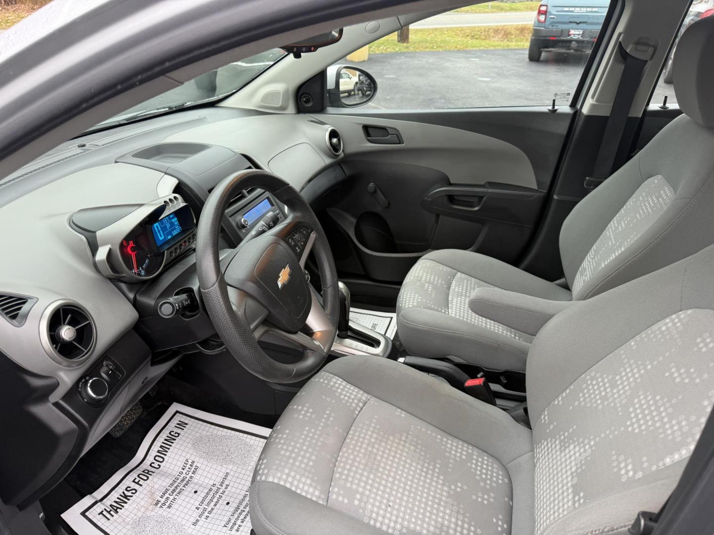 2016 Silver /Gray Chevrolet Sonic LS Auto Sedan (1G1JA5SG7G4) with an 1.8L I4 DOHC 24V engine, Automatic transmission, located at 11115 Chardon Rd. , Chardon, OH, 44024, (440) 214-9705, 41.580246, -81.241943 - One Owner – 2016 Chevrolet Sonic LS Sedan – Efficient, Stylish, and Ready to Drive Discover the perfect balance of economy and style with this 2016 Chevrolet Sonic LS Sedan. Powered by a reliable 1.8L I4 EcoTec engine and paired with a smooth 6-speed automatic transmission, this compact sedan - Photo#15