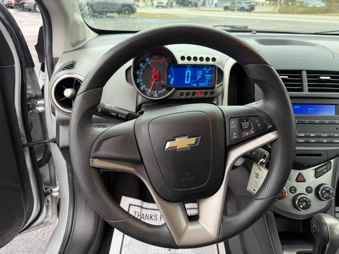 2016 Silver /Gray Chevrolet Sonic LS Auto Sedan (1G1JA5SG7G4) with an 1.8L I4 DOHC 24V engine, Automatic transmission, located at 11115 Chardon Rd. , Chardon, OH, 44024, (440) 214-9705, 41.580246, -81.241943 - One Owner – 2016 Chevrolet Sonic LS Sedan – Efficient, Stylish, and Ready to Drive Discover the perfect balance of economy and style with this 2016 Chevrolet Sonic LS Sedan. Powered by a reliable 1.8L I4 EcoTec engine and paired with a smooth 6-speed automatic transmission, this compact sedan - Photo#22