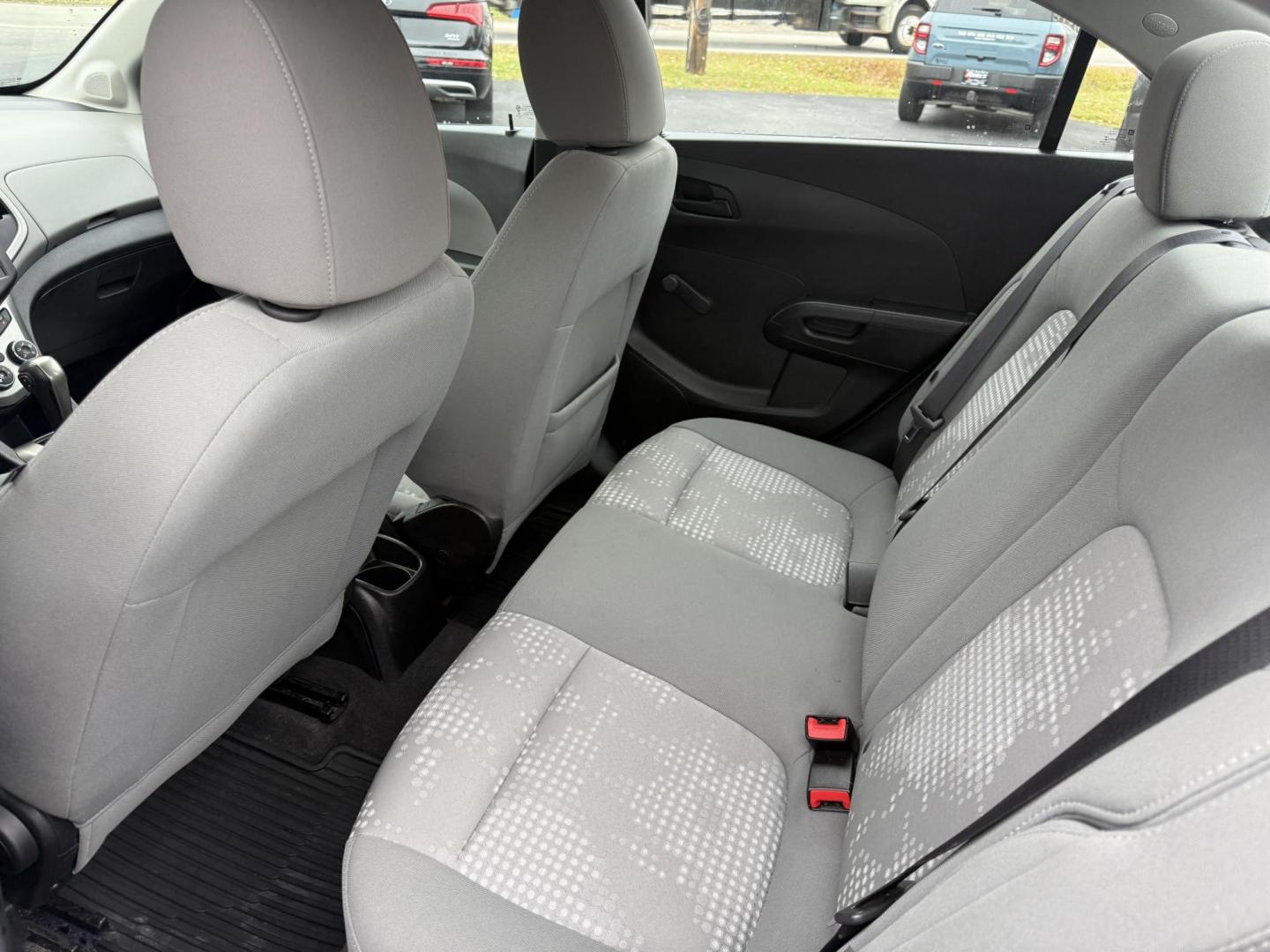 2016 Silver /Gray Chevrolet Sonic LS Auto Sedan (1G1JA5SG7G4) with an 1.8L I4 DOHC 24V engine, Automatic transmission, located at 11115 Chardon Rd. , Chardon, OH, 44024, (440) 214-9705, 41.580246, -81.241943 - One Owner – 2016 Chevrolet Sonic LS Sedan – Efficient, Stylish, and Ready to Drive Discover the perfect balance of economy and style with this 2016 Chevrolet Sonic LS Sedan. Powered by a reliable 1.8L I4 EcoTec engine and paired with a smooth 6-speed automatic transmission, this compact sedan - Photo#27