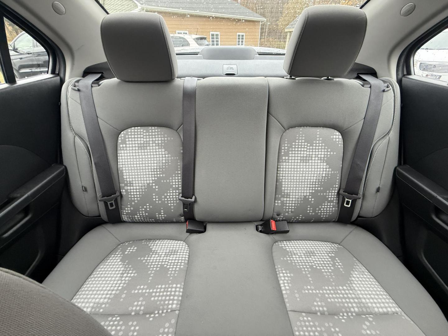 2016 Silver /Gray Chevrolet Sonic LS Auto Sedan (1G1JA5SG7G4) with an 1.8L I4 DOHC 24V engine, Automatic transmission, located at 11115 Chardon Rd. , Chardon, OH, 44024, (440) 214-9705, 41.580246, -81.241943 - One Owner – 2016 Chevrolet Sonic LS Sedan – Efficient, Stylish, and Ready to Drive Discover the perfect balance of economy and style with this 2016 Chevrolet Sonic LS Sedan. Powered by a reliable 1.8L I4 EcoTec engine and paired with a smooth 6-speed automatic transmission, this compact sedan - Photo#26