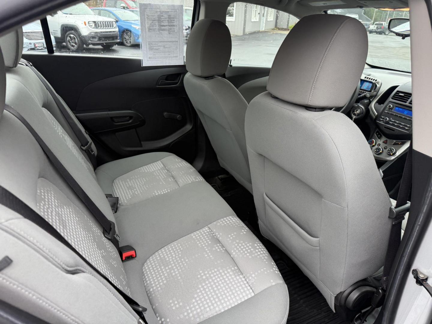 2016 Silver /Gray Chevrolet Sonic LS Auto Sedan (1G1JA5SG7G4) with an 1.8L I4 DOHC 24V engine, Automatic transmission, located at 11115 Chardon Rd. , Chardon, OH, 44024, (440) 214-9705, 41.580246, -81.241943 - One Owner – 2016 Chevrolet Sonic LS Sedan – Efficient, Stylish, and Ready to Drive Discover the perfect balance of economy and style with this 2016 Chevrolet Sonic LS Sedan. Powered by a reliable 1.8L I4 EcoTec engine and paired with a smooth 6-speed automatic transmission, this compact sedan - Photo#33