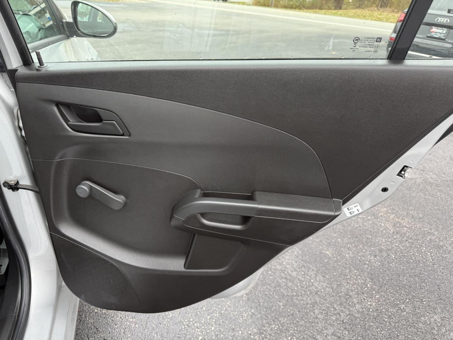 2016 Silver /Gray Chevrolet Sonic LS Auto Sedan (1G1JA5SG7G4) with an 1.8L I4 DOHC 24V engine, Automatic transmission, located at 11115 Chardon Rd. , Chardon, OH, 44024, (440) 214-9705, 41.580246, -81.241943 - One Owner – 2016 Chevrolet Sonic LS Sedan – Efficient, Stylish, and Ready to Drive Discover the perfect balance of economy and style with this 2016 Chevrolet Sonic LS Sedan. Powered by a reliable 1.8L I4 EcoTec engine and paired with a smooth 6-speed automatic transmission, this compact sedan - Photo#34