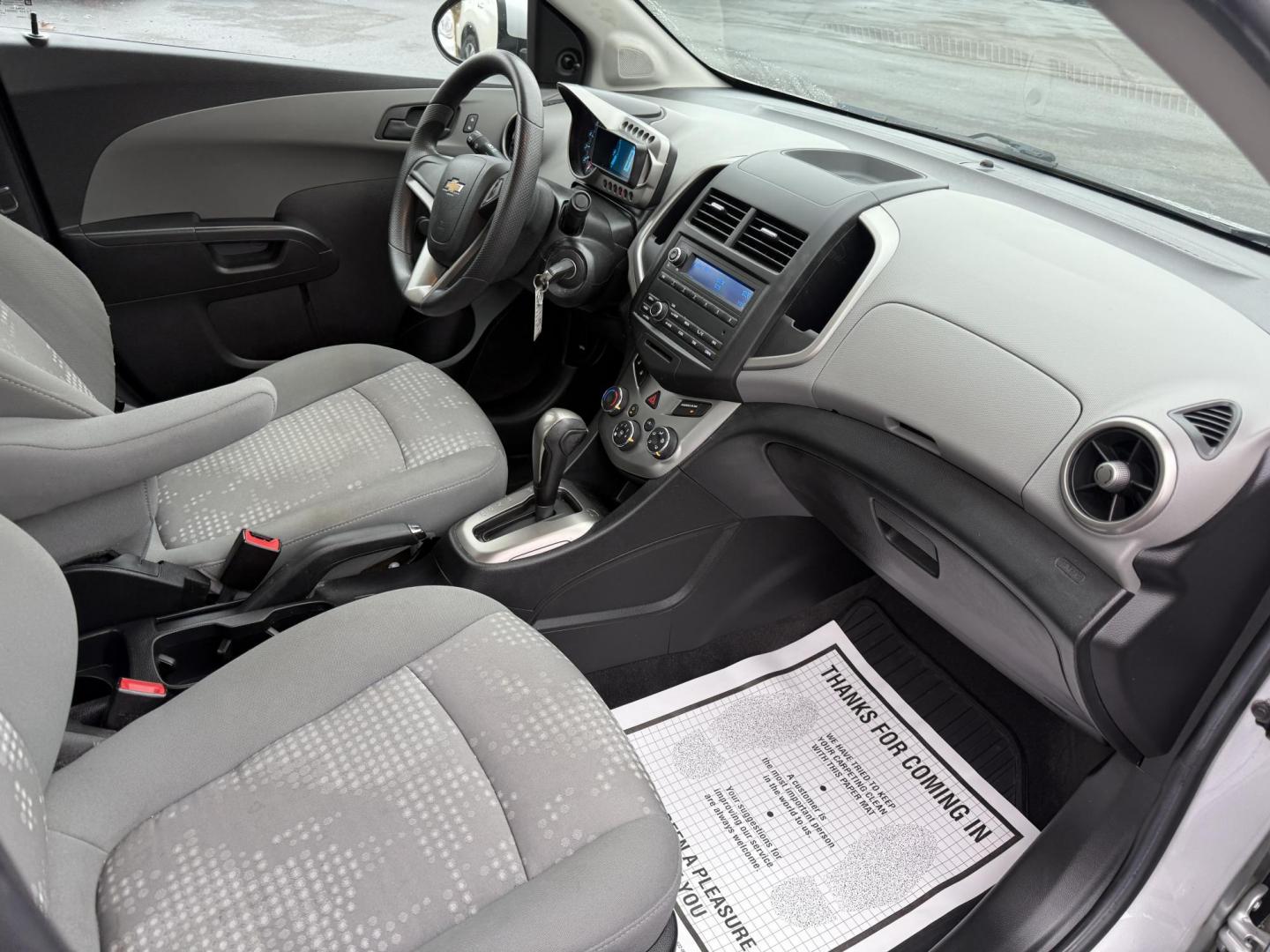 2016 Silver /Gray Chevrolet Sonic LS Auto Sedan (1G1JA5SG7G4) with an 1.8L I4 DOHC 24V engine, Automatic transmission, located at 11115 Chardon Rd. , Chardon, OH, 44024, (440) 214-9705, 41.580246, -81.241943 - One Owner – 2016 Chevrolet Sonic LS Sedan – Efficient, Stylish, and Ready to Drive Discover the perfect balance of economy and style with this 2016 Chevrolet Sonic LS Sedan. Powered by a reliable 1.8L I4 EcoTec engine and paired with a smooth 6-speed automatic transmission, this compact sedan - Photo#35