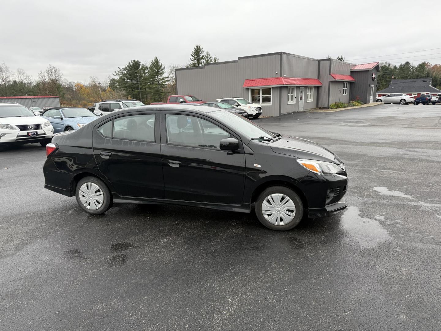 2021 Black /Black Mitsubishi Mirage G4 ES Auto (ML32FUFJ6MH) with an 1.2L I3 DOHC engine, Automatic transmission, located at 11115 Chardon Rd. , Chardon, OH, 44024, (440) 214-9705, 41.580246, -81.241943 - 2021 Mitsubishi Mirage G4 ES – Efficient, Compact, and Packed with Safety Features Discover an affordable and reliable ride with this 2021 Mitsubishi Mirage G4 ES. Powered by a fuel-efficient 1.2L I3 engine and equipped with Sport Mode, this sedan delivers an impressive 37 MPG combined and 41 M - Photo#3
